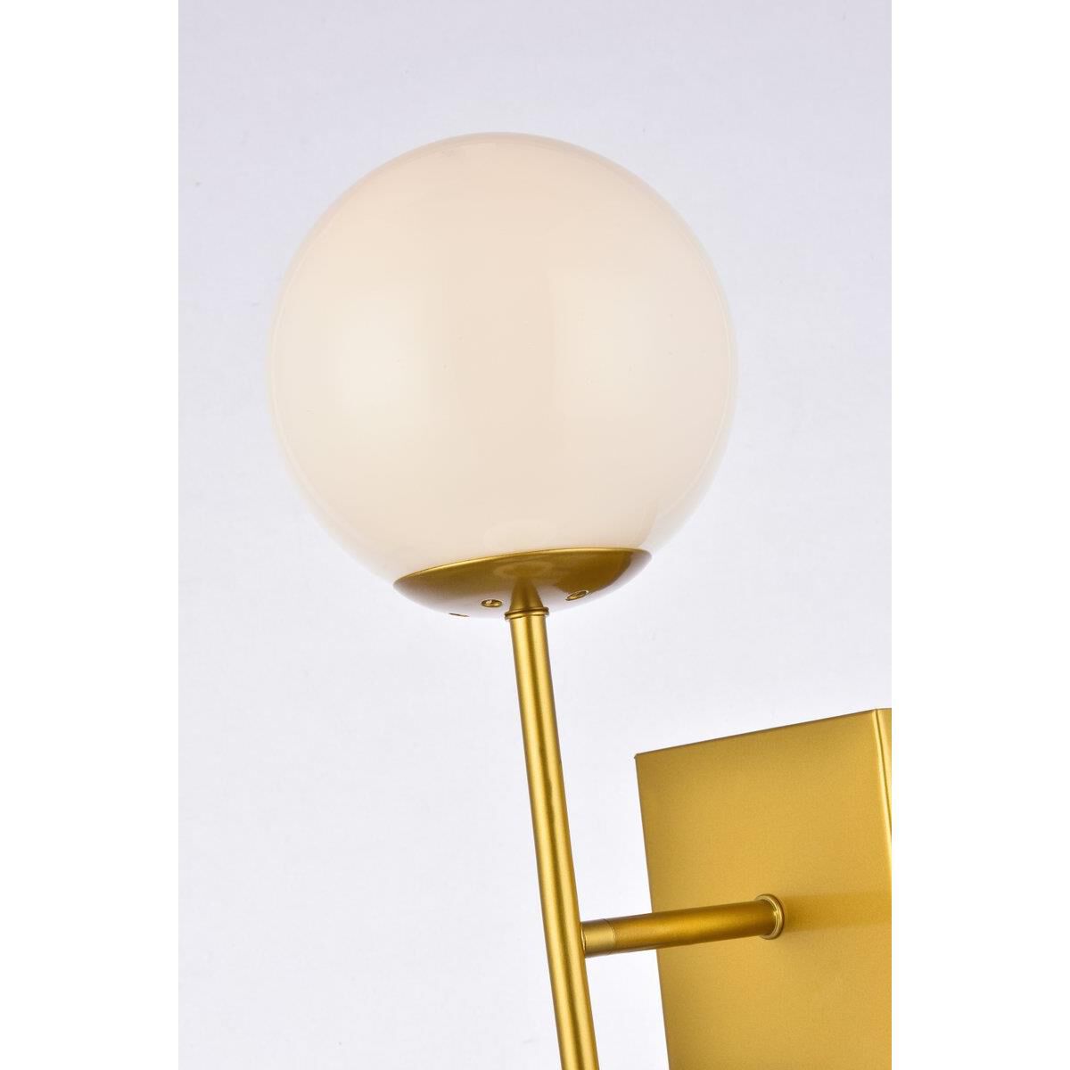 Shown in Black and Brass finish and White glass