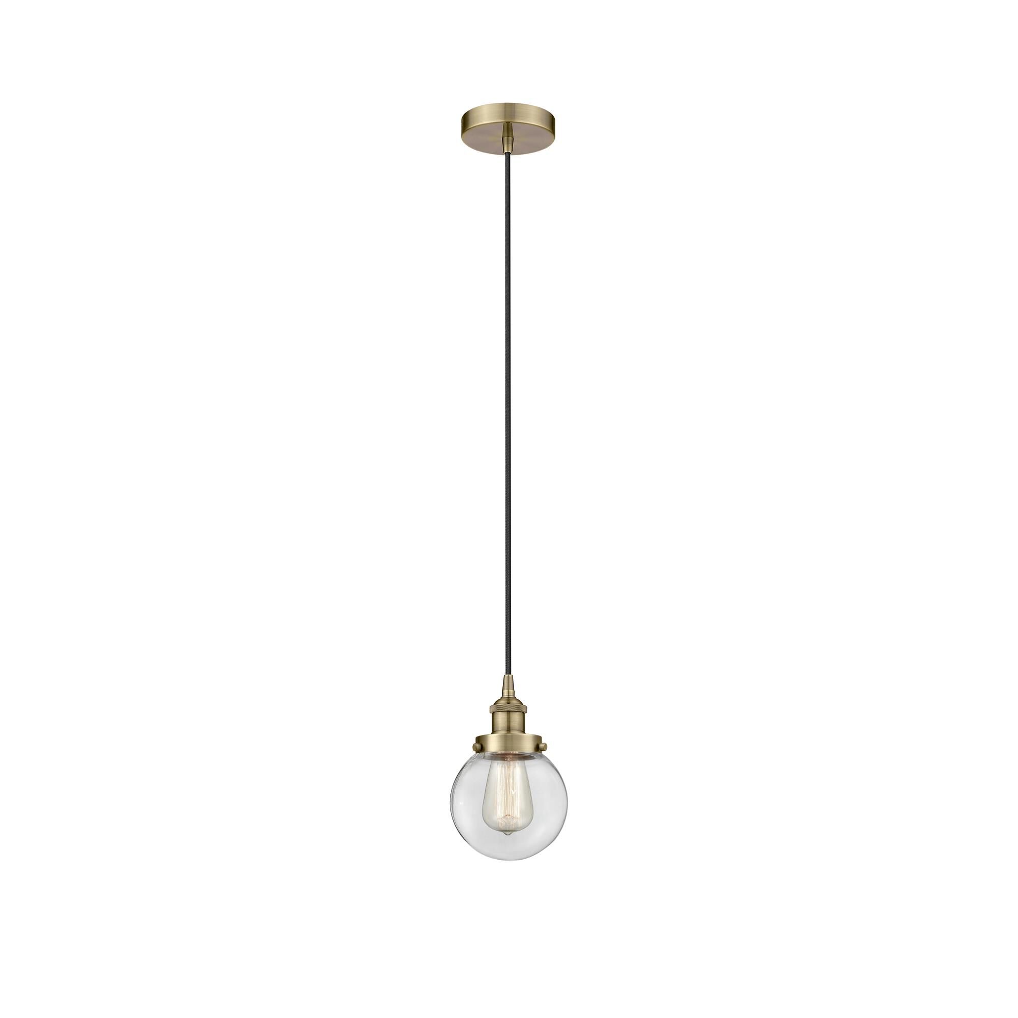 Shown in Antique Brass finish and Clear glass