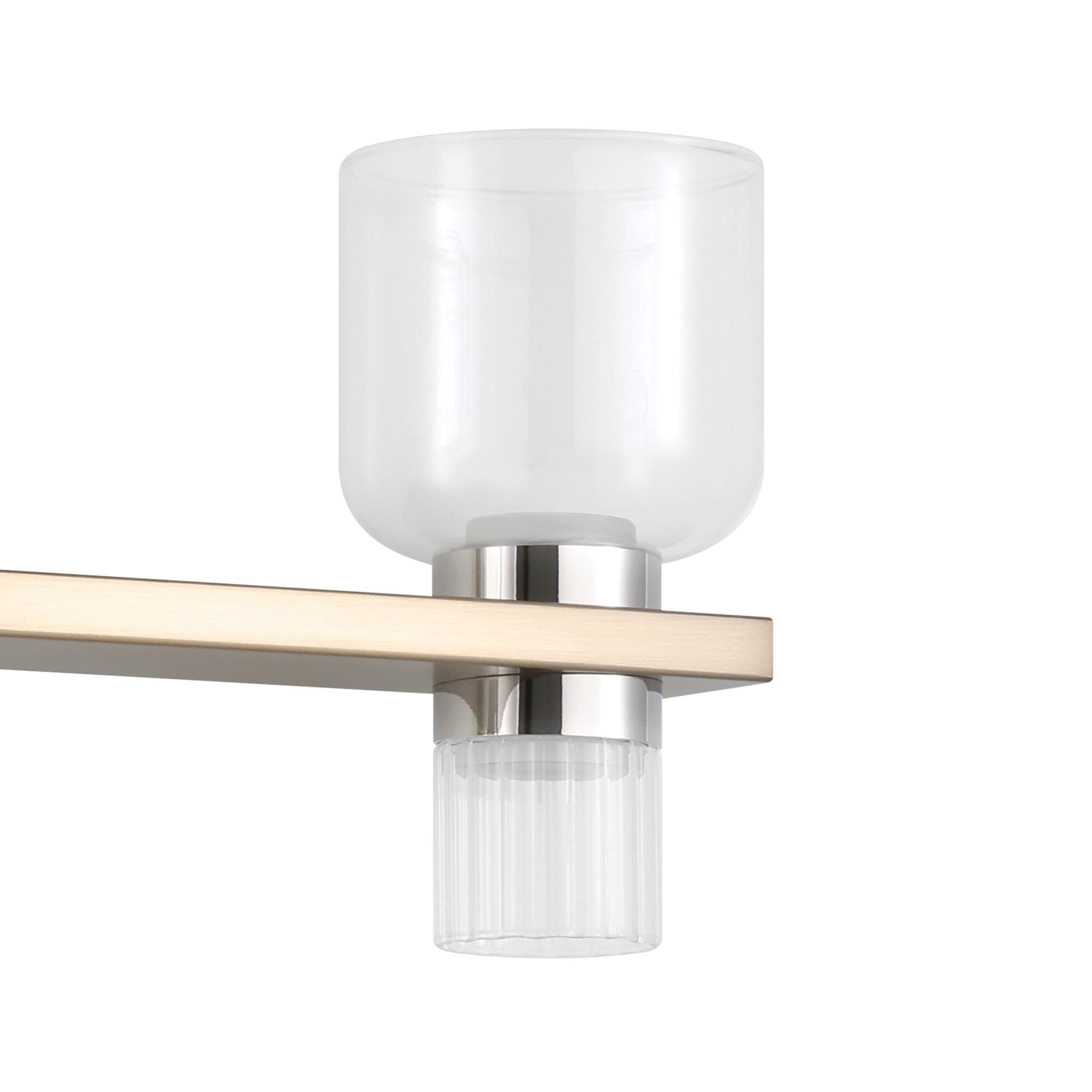Shown in Champagne Gold finish and Clear, Clear Ribbed glass