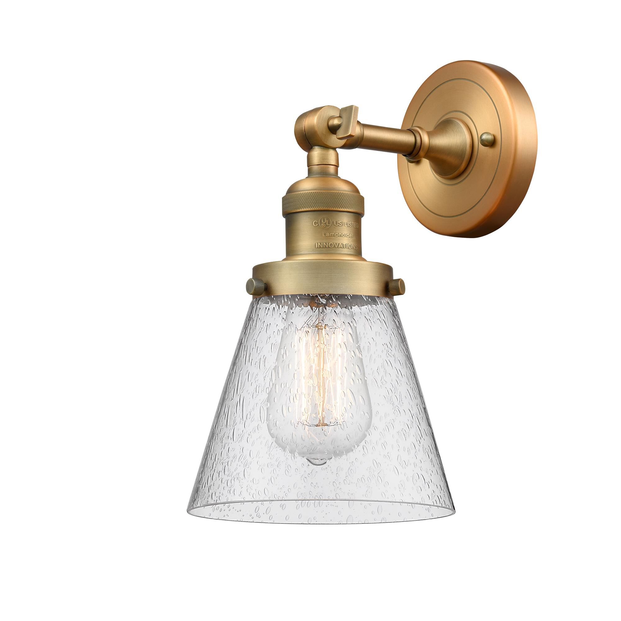 Shown in Brushed Brass finish and Seedy glass