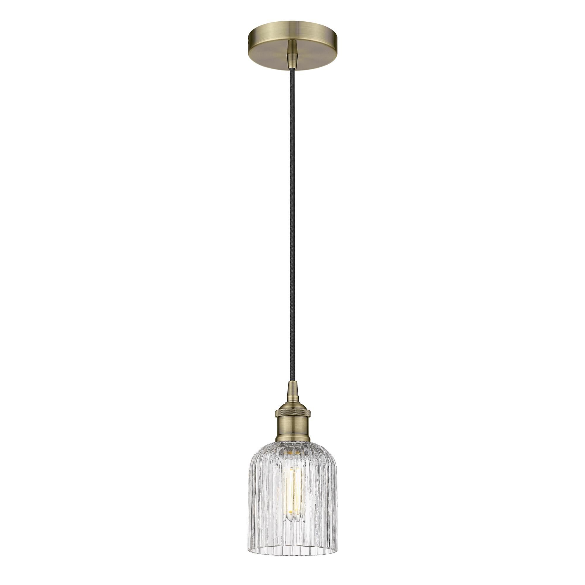 Shown in Antique Brass finish and Clear glass