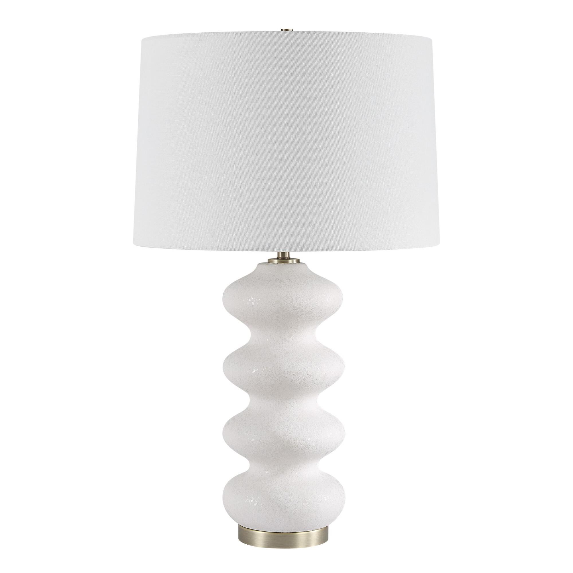 Shown in This Porcelain Lamp Exudes An Elegant Quality With Its Graceful Flowing Design And White Tone-On-Ton finish and Round Hardback shade