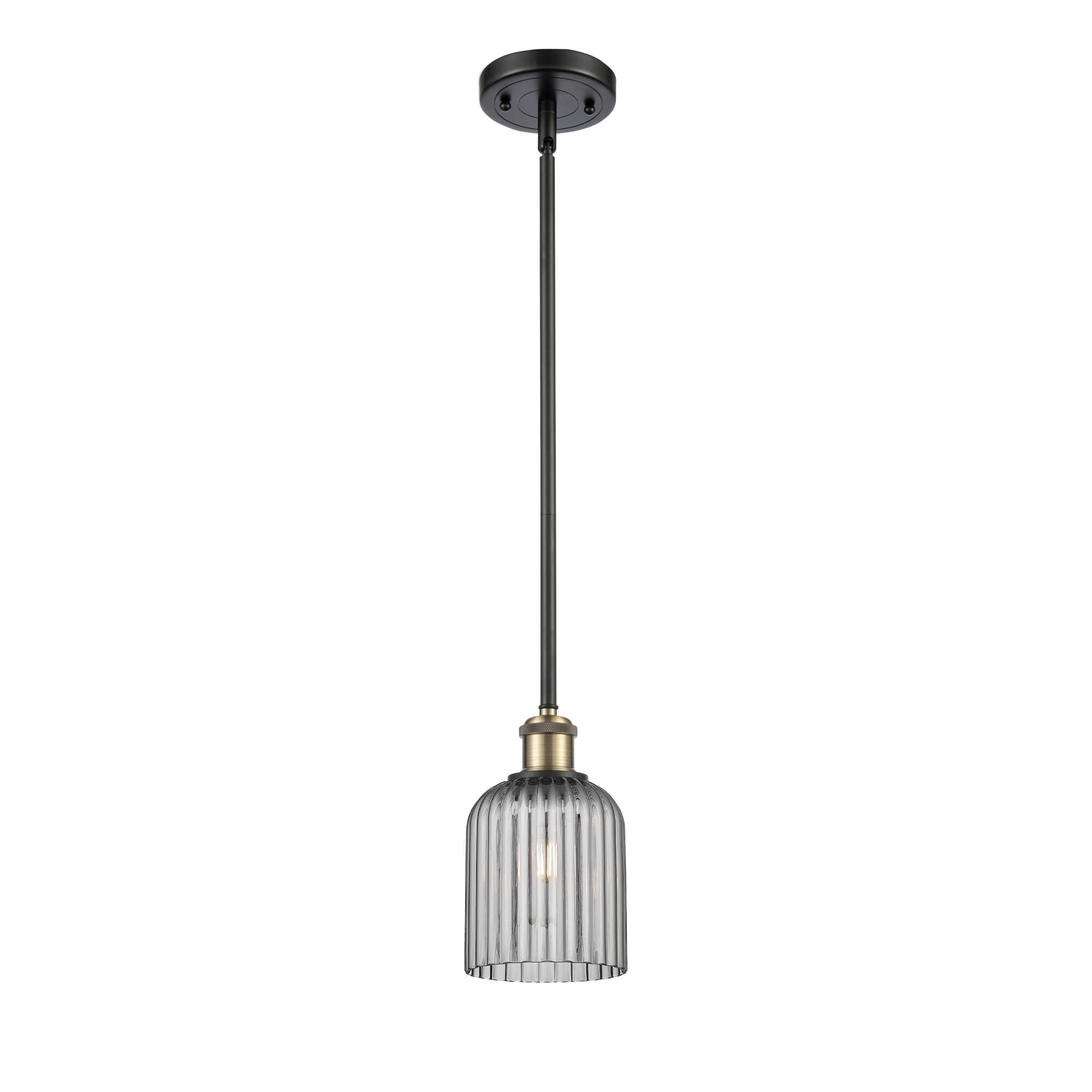 Shown in Black Antique Brass finish and Light Smoke shade