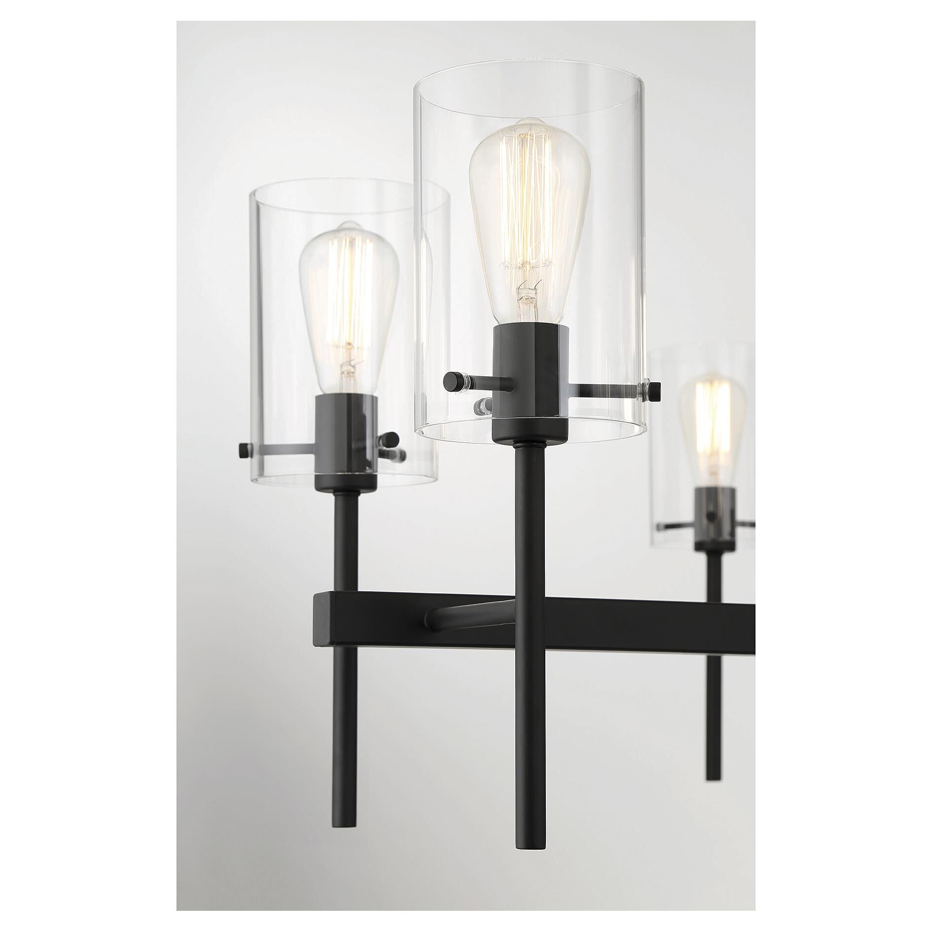 Shown in Matte Black finish and Clear glass and Glass shade