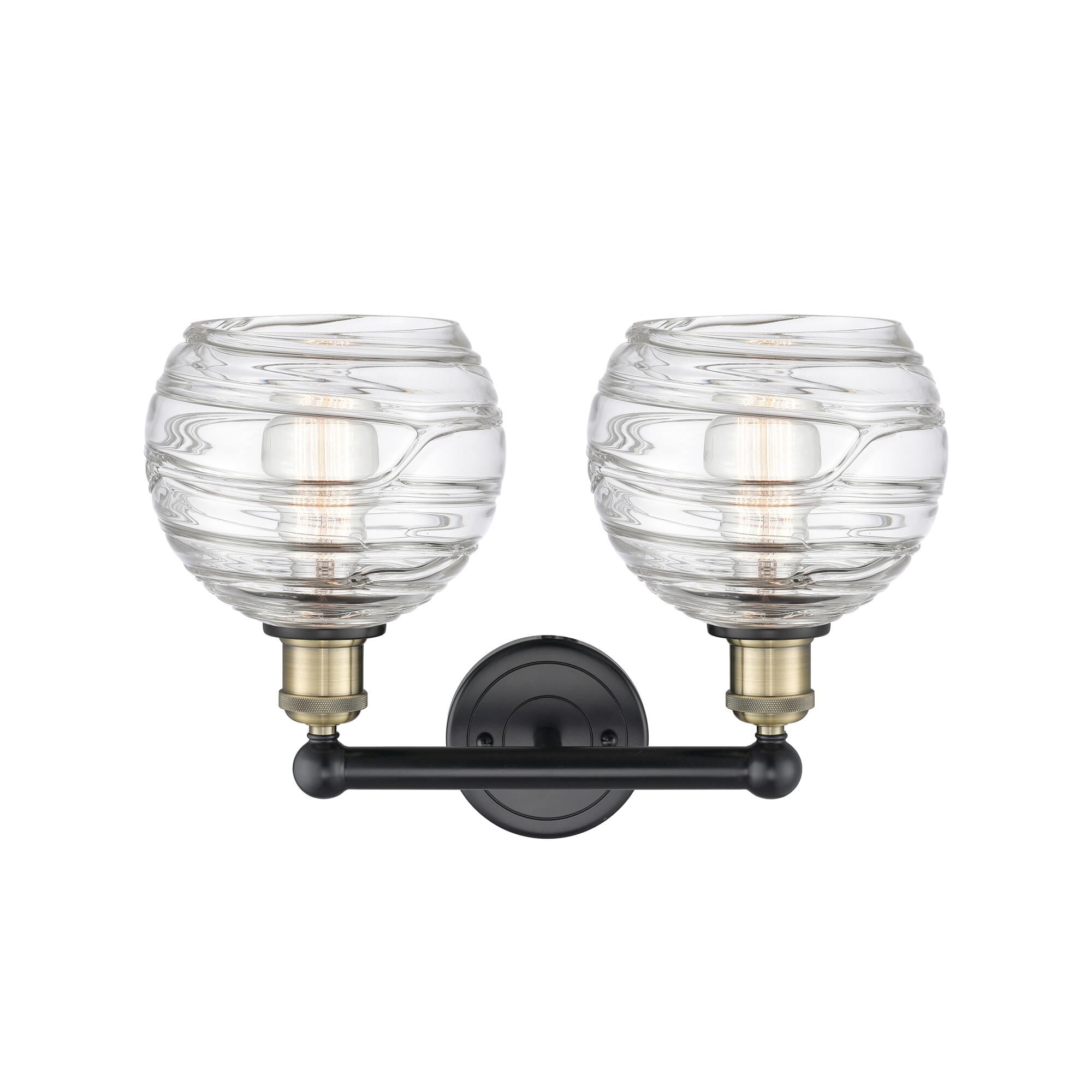 Shown in Black Antique Brass finish and Clear Deco Swirl glass
