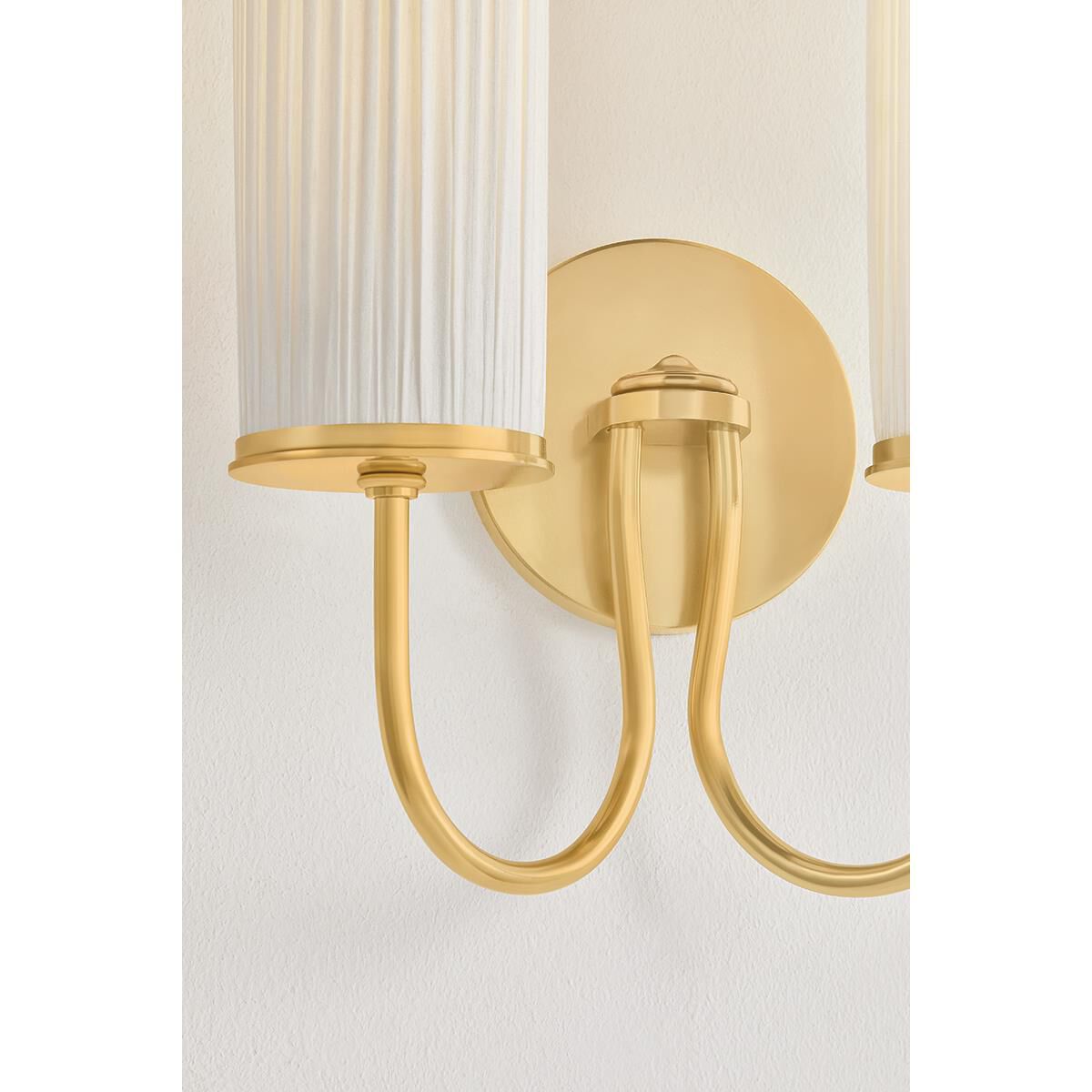 Shown in Aged Brass finish and Ivory Silk shade