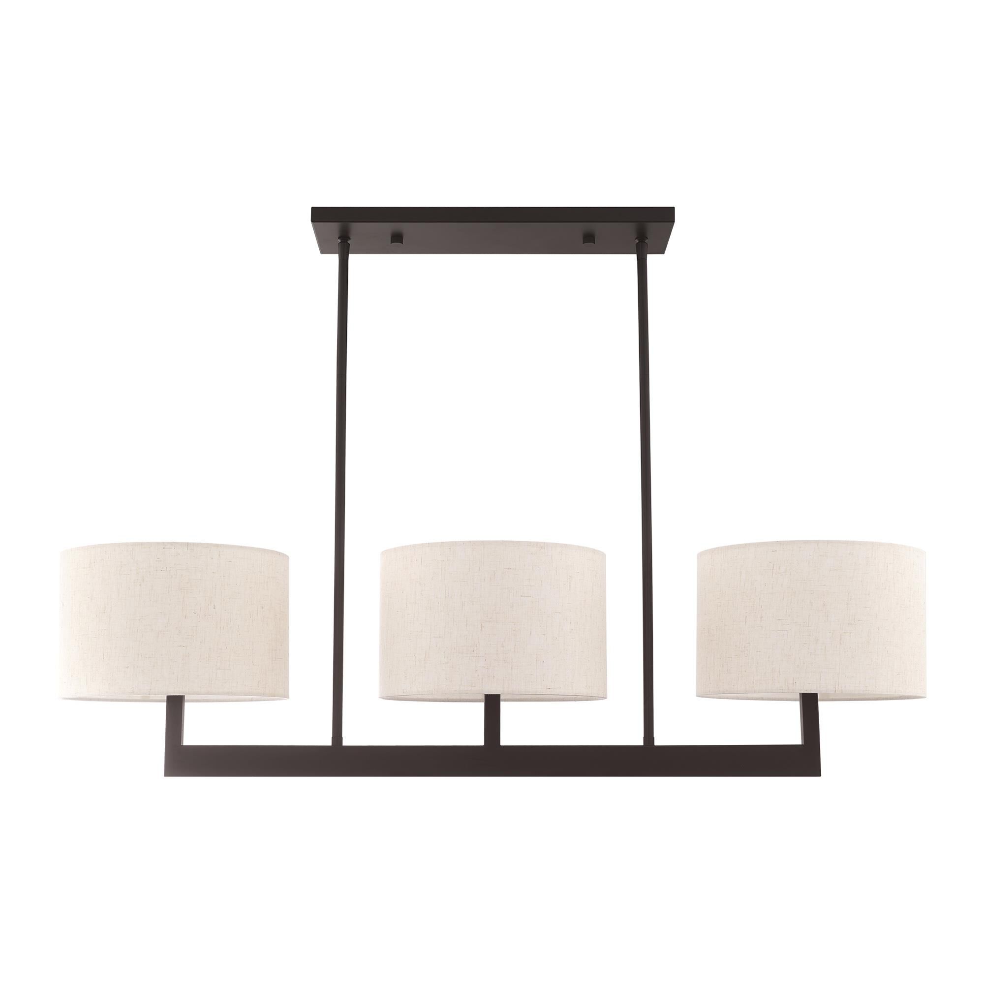 Shown in Bronze finish and Hand Crafted Oatmeal Color Fabric Outside & White Fabric Inside Hardback shade