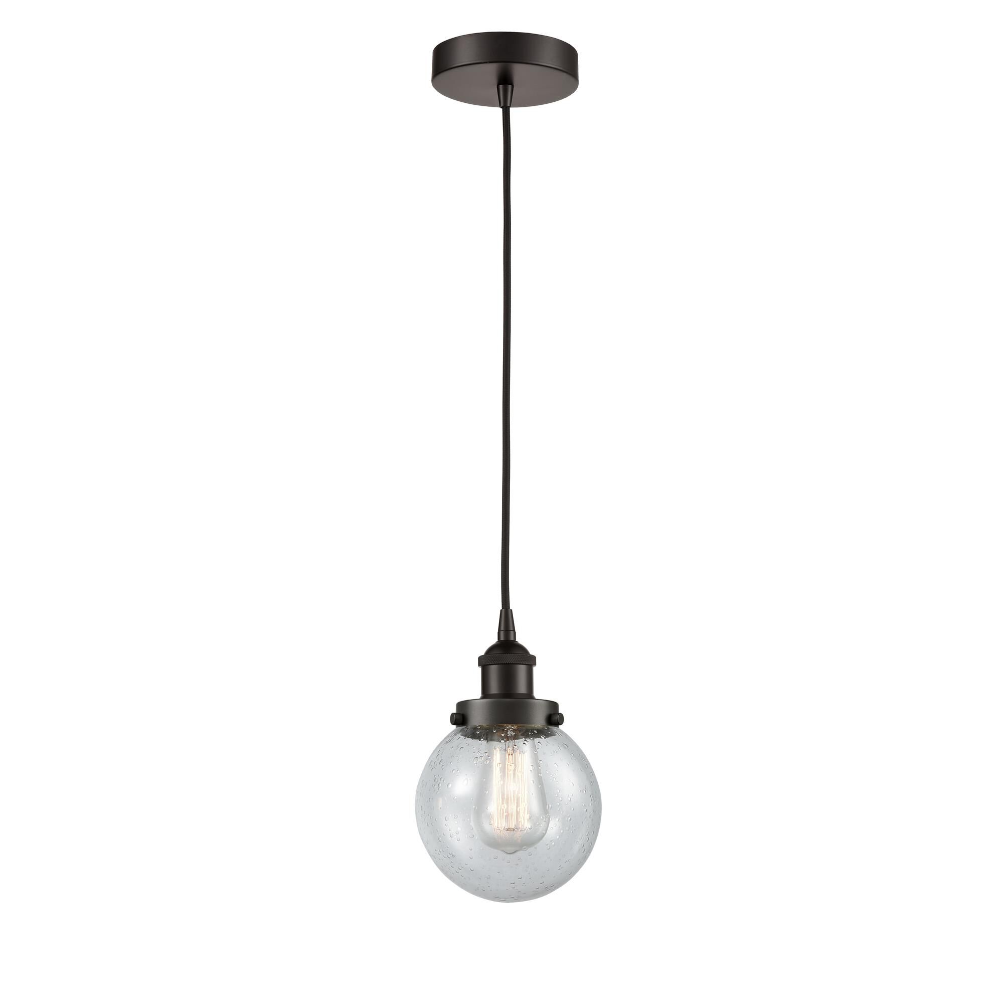 Shown in Oil Rubbed Bronze finish and Seedy Beacon glass