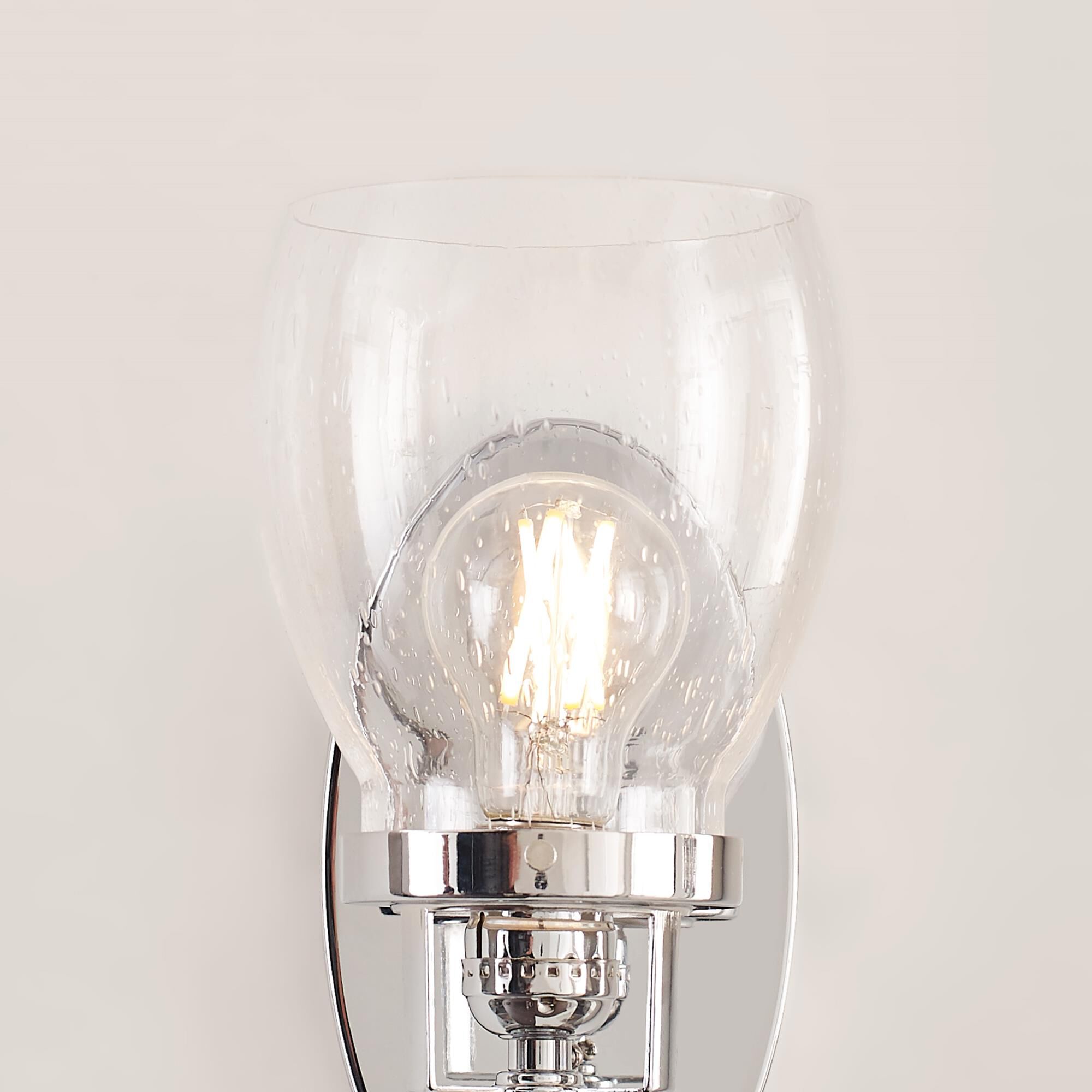 Shown in Chrome finish and Clear Seeded glass