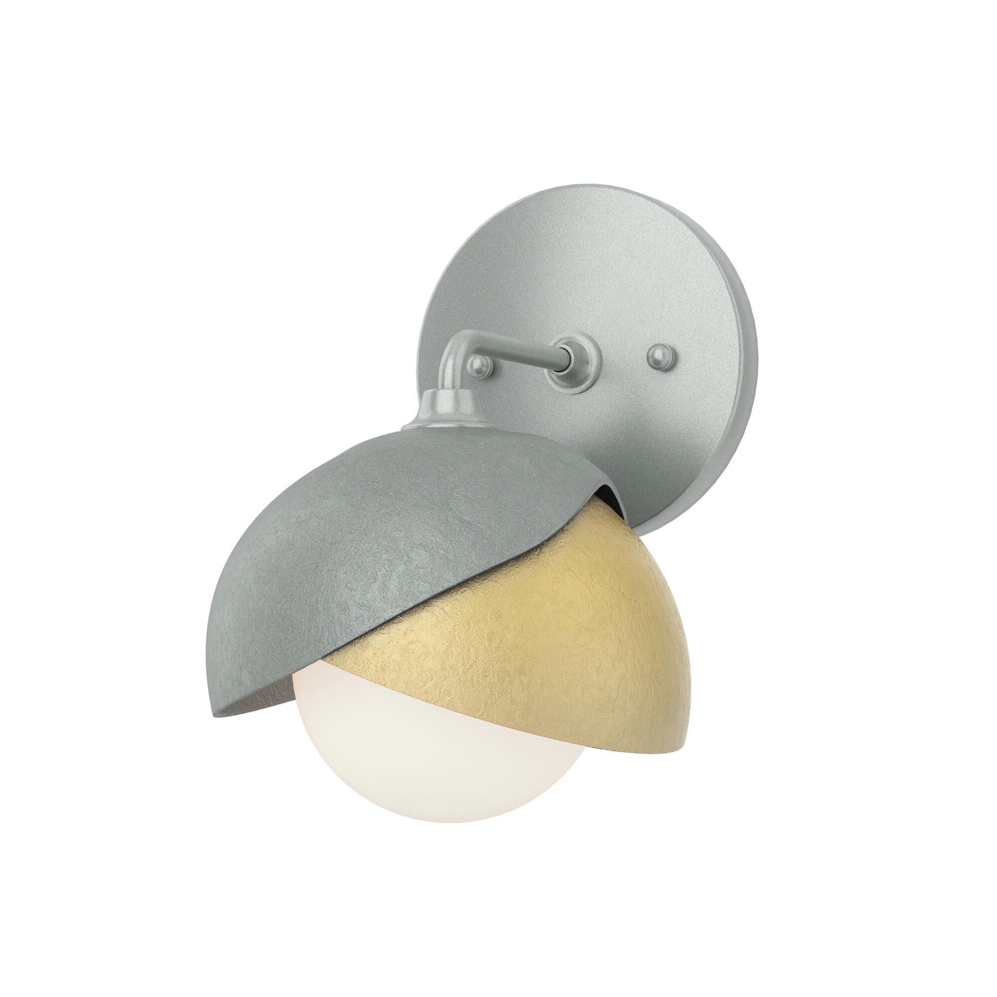Shown in Vintage Platinum finish and Opal glass and Modern Brass (86) accent