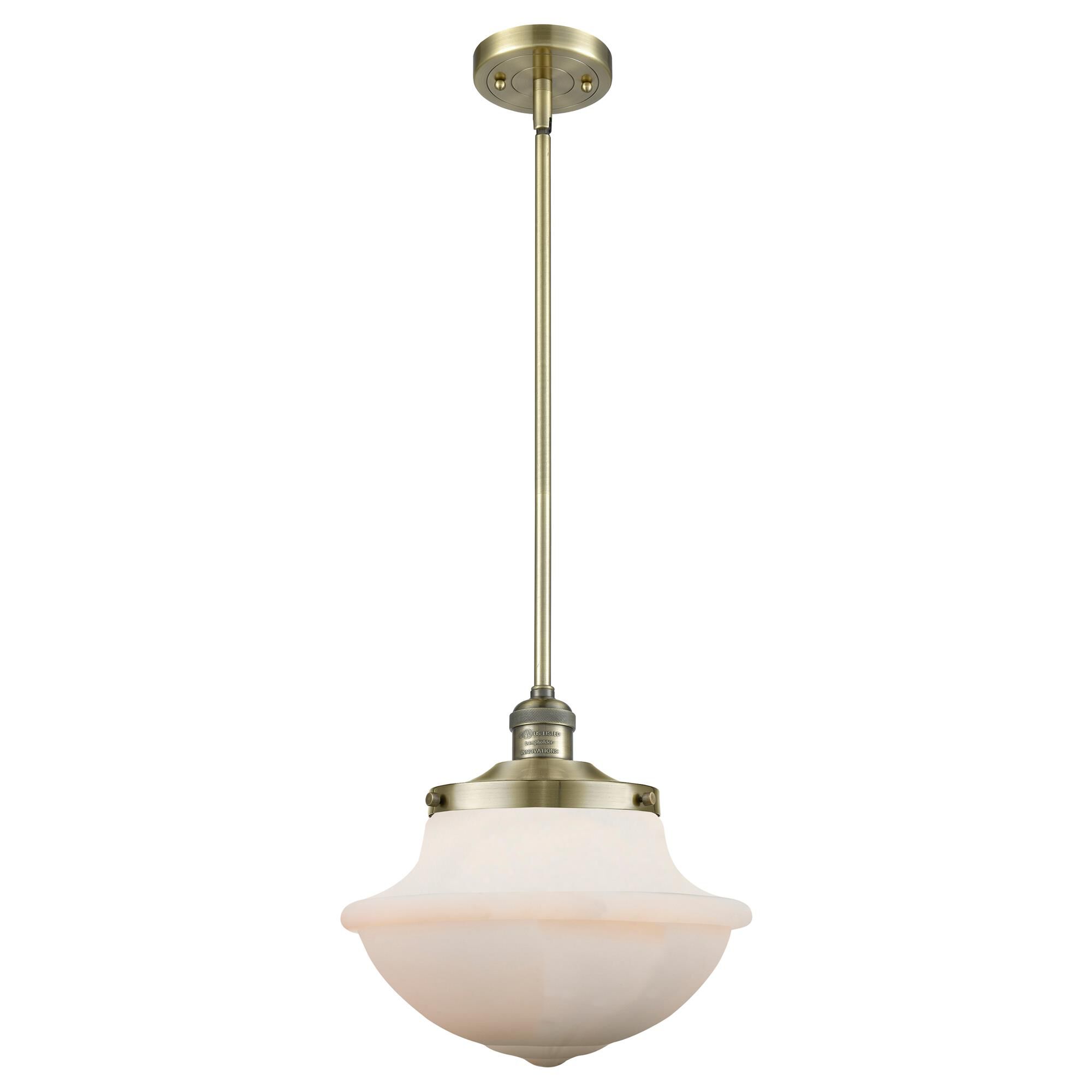 Shown in Antique Brass finish and Glass shade and Bulb Tint - Amber accent