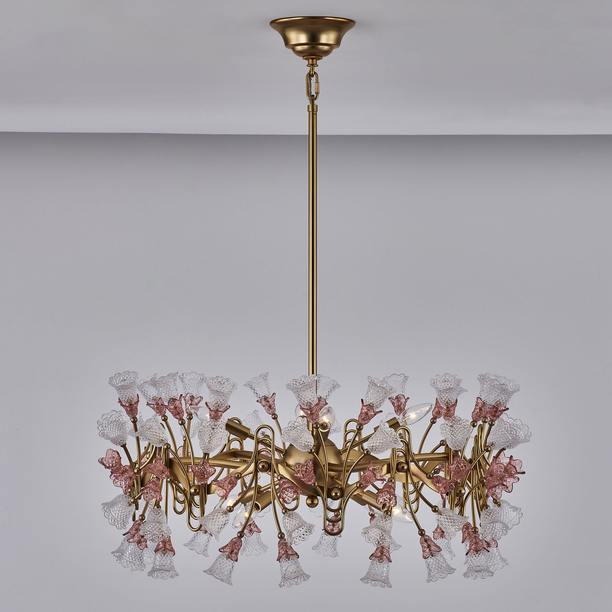 Shown in Antique Brass finish and Vintage Rose crystal