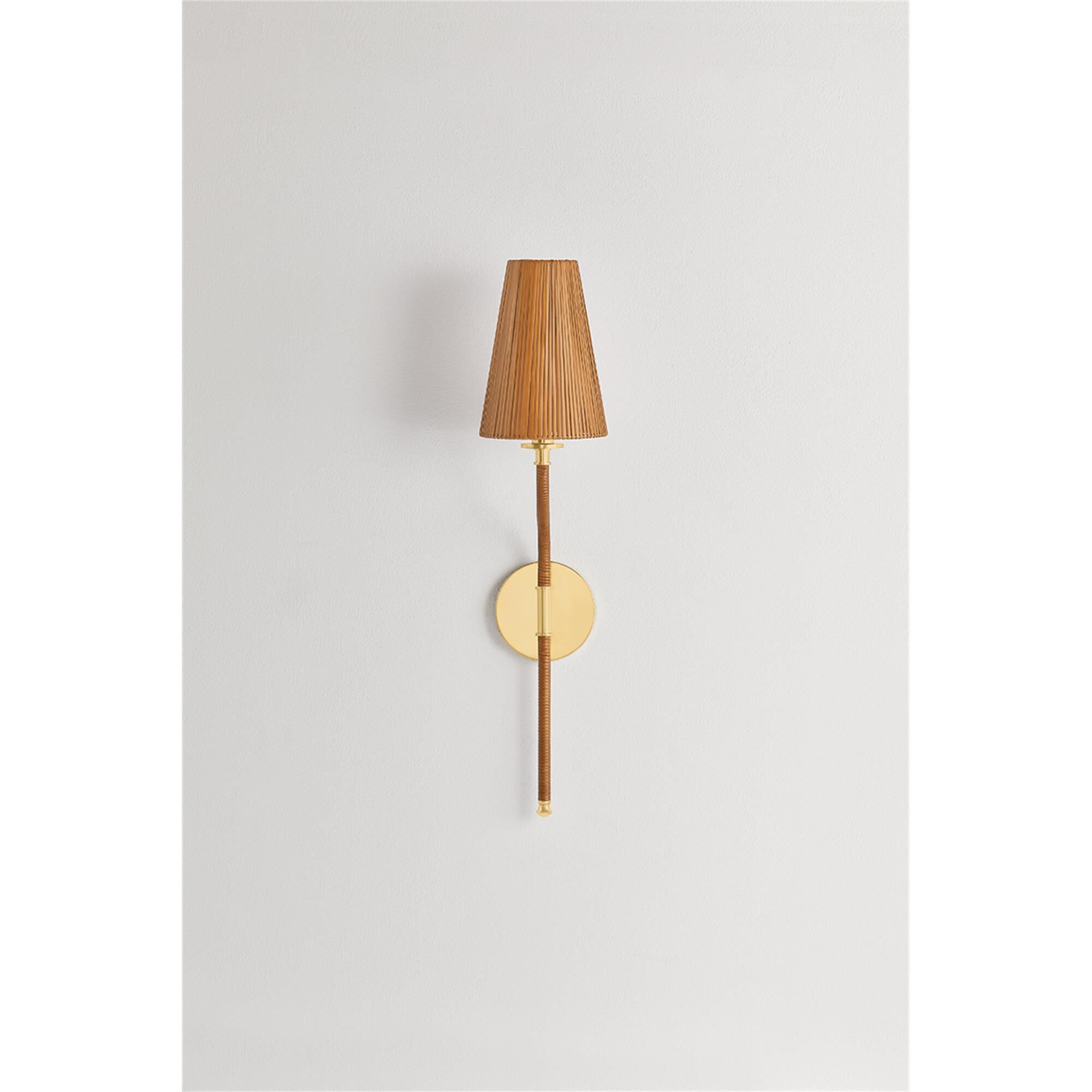 Shown in Aged Brass finish and Natural Woven Rattan shade