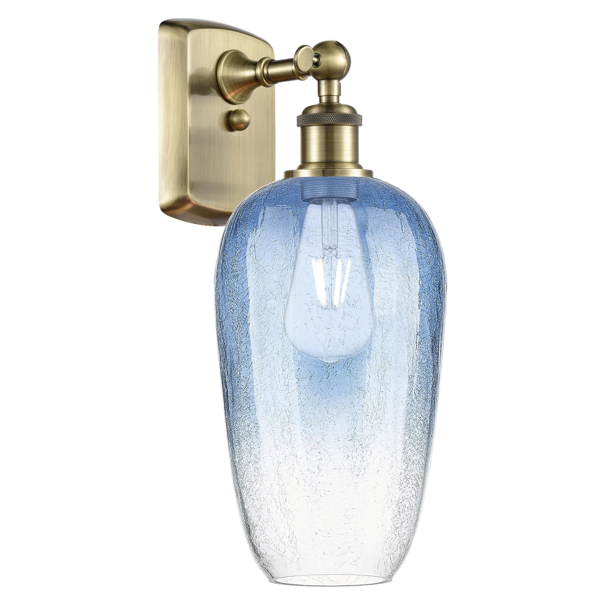 Shown in Antique Brass finish and Sapphire Blue glass