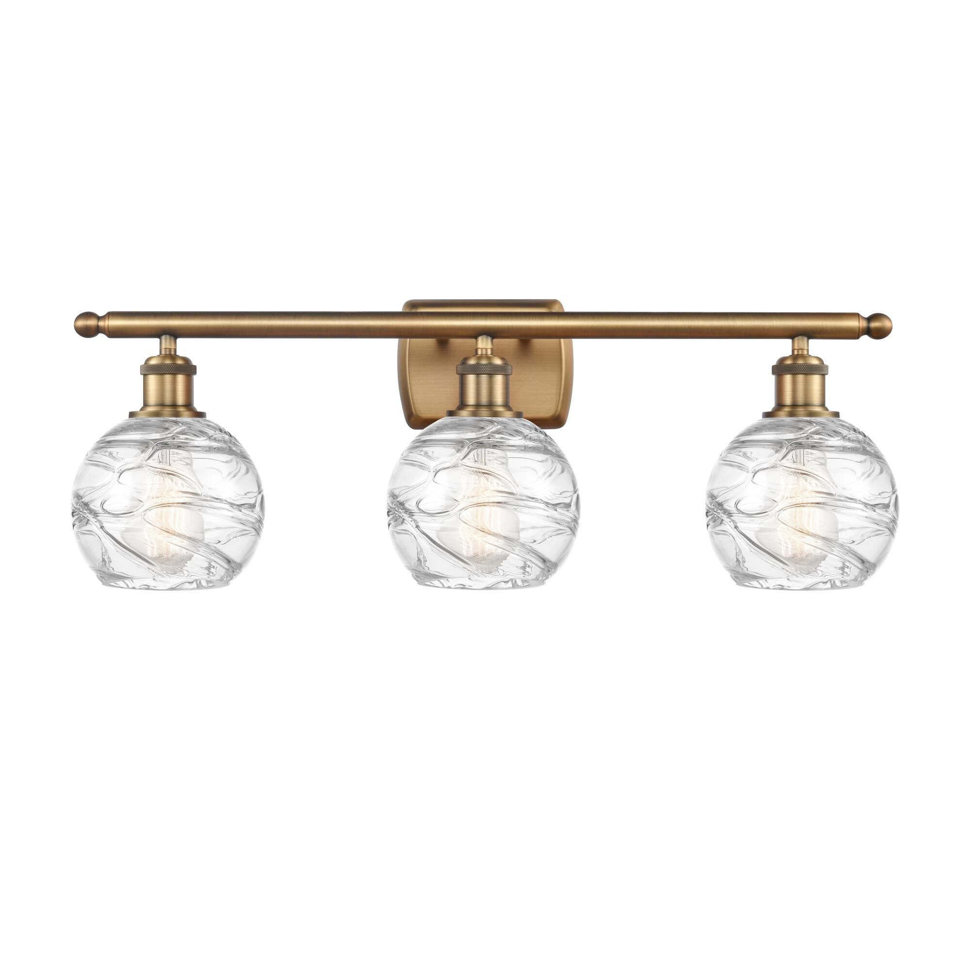 Shown in Brushed Brass finish and Sphere glass and Glass shade