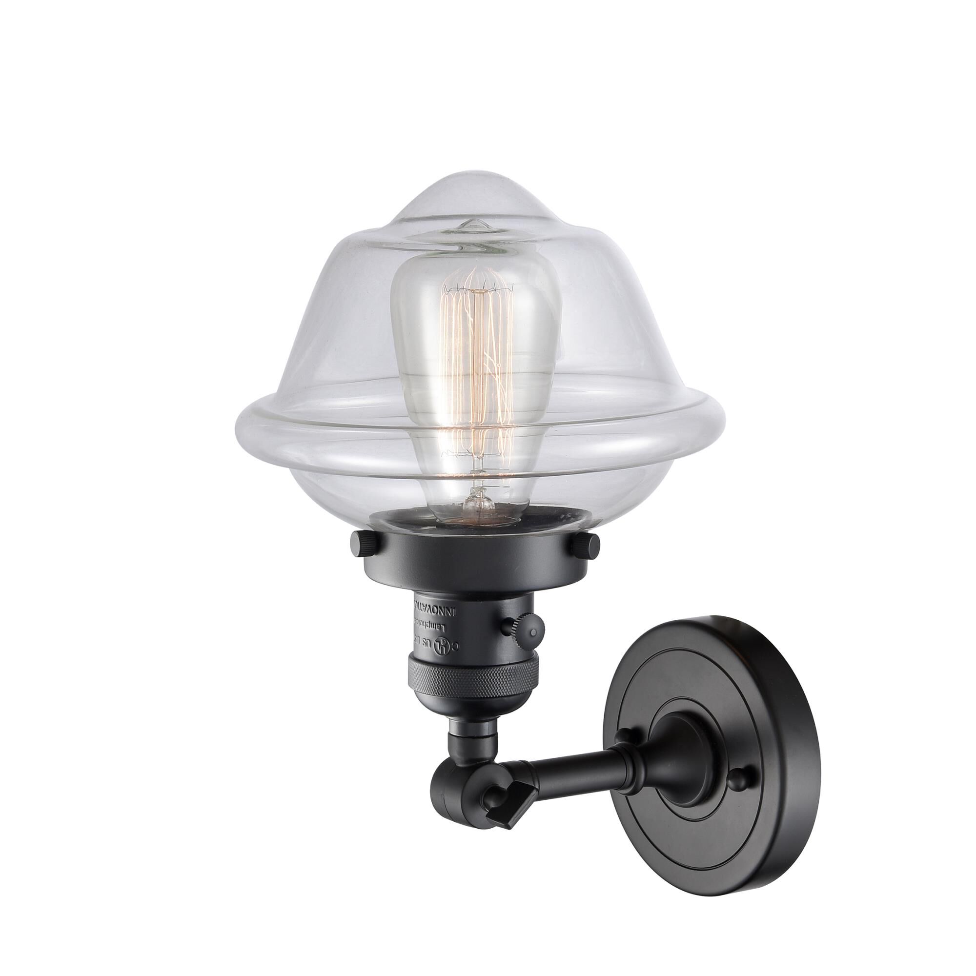 Shown in Matte Black finish and Clear glass and Switch on Socket accent