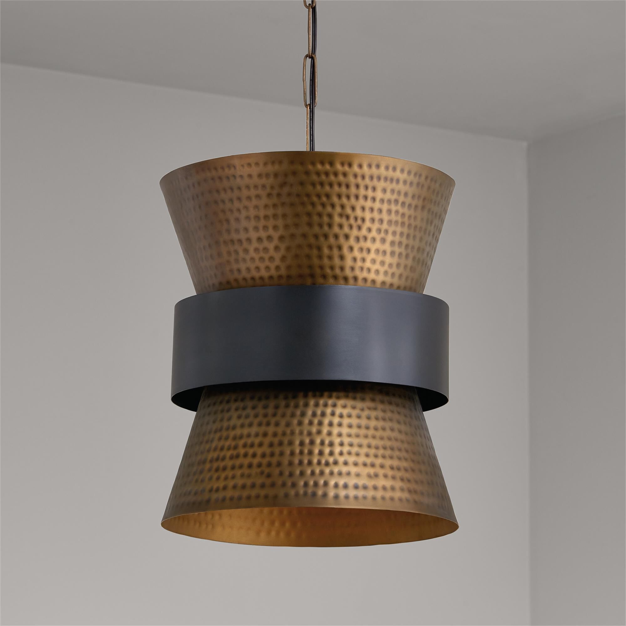 Shown in Patinaed Brass And Dark Zinc finish