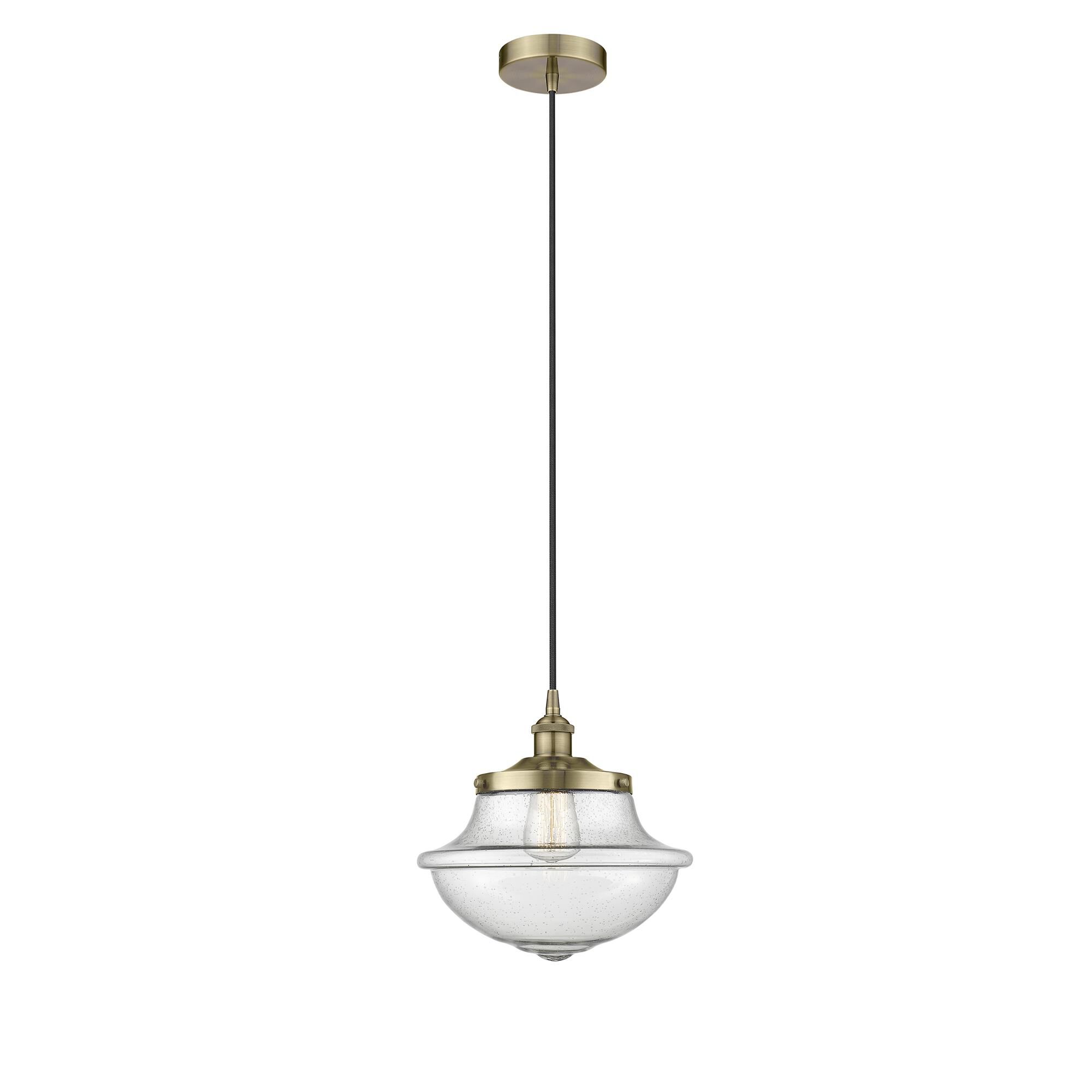 Shown in Antique Brass finish and Seedy glass
