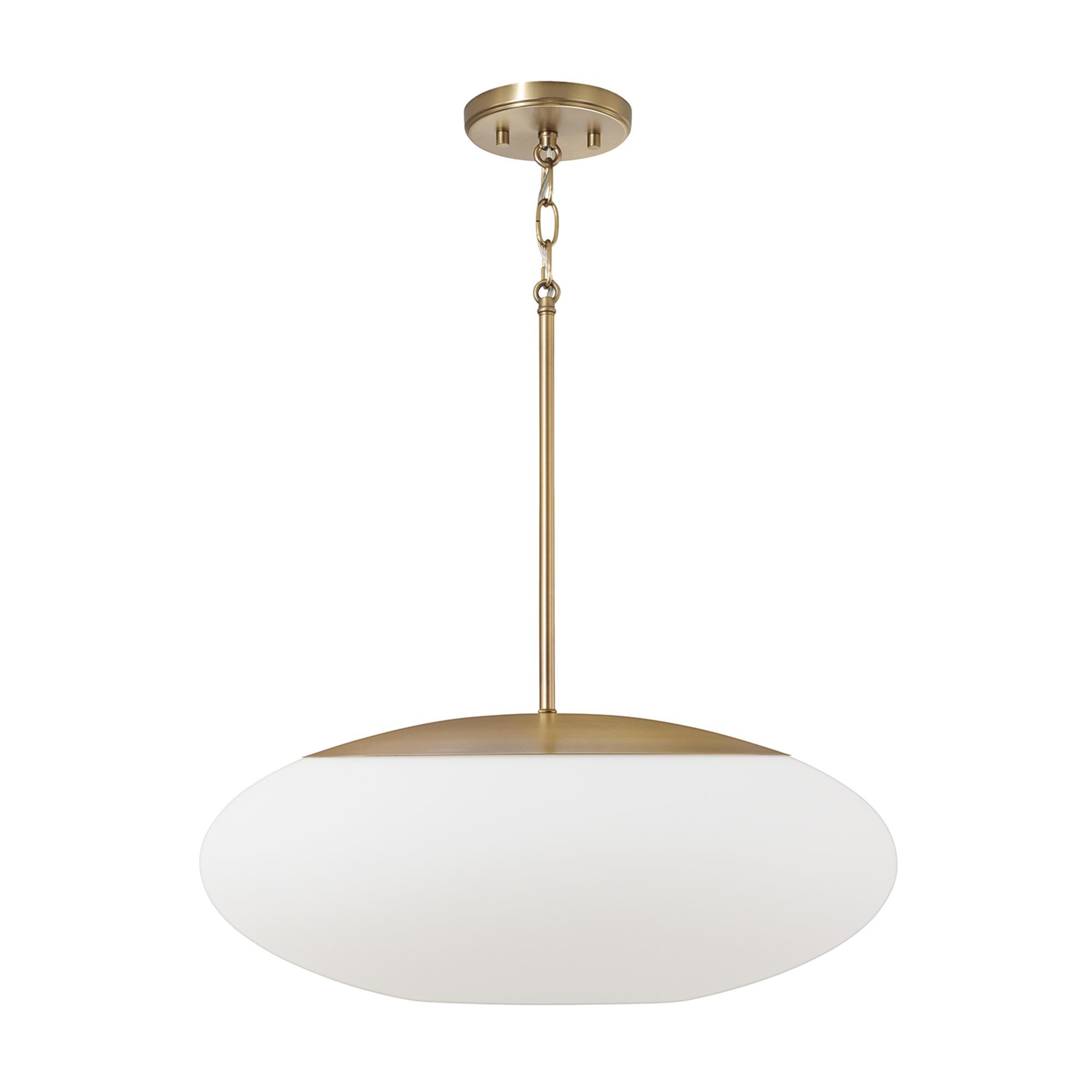 Shown in Aged Brass finish and Soft White glass