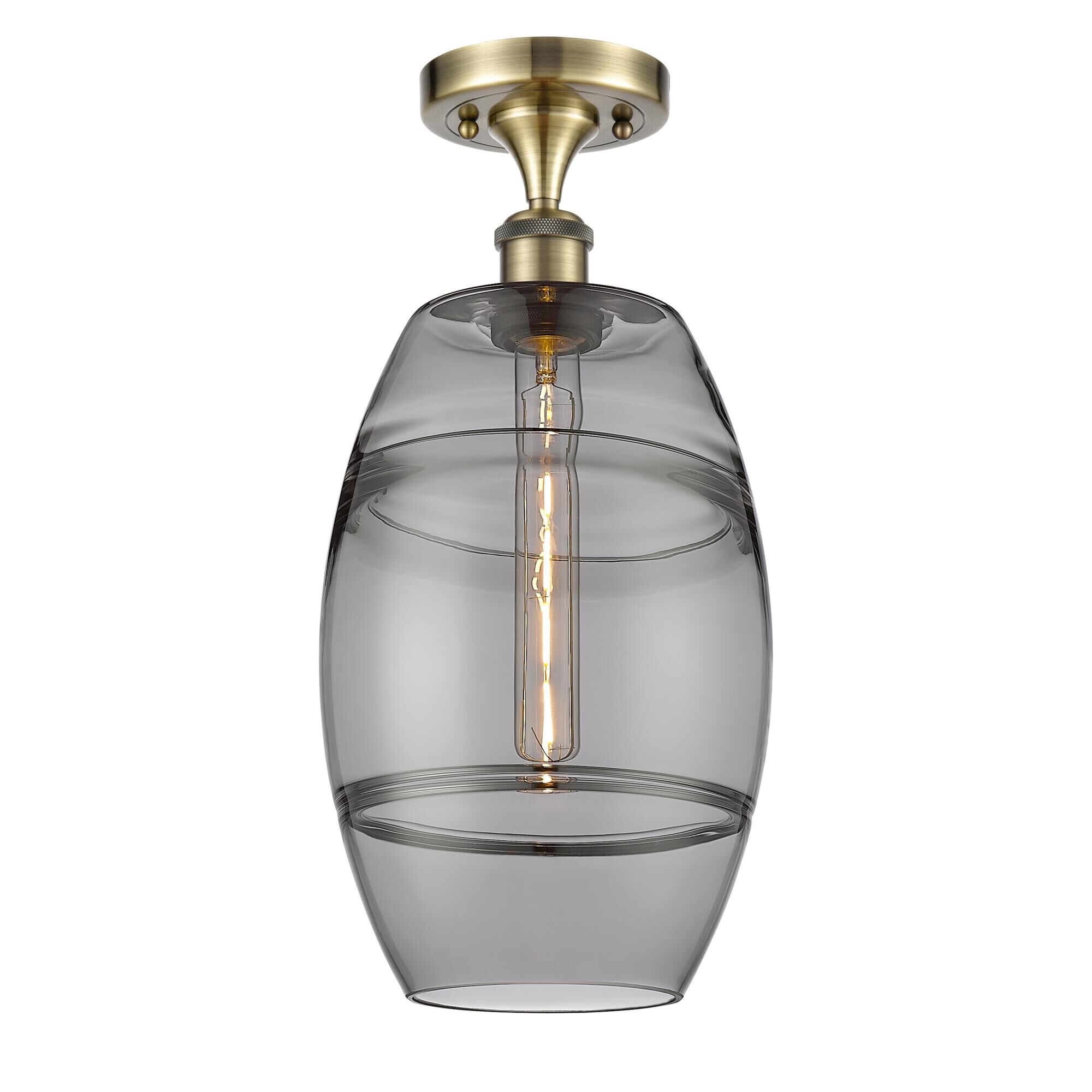 Shown in Antique Brass finish and Light Smoke glass