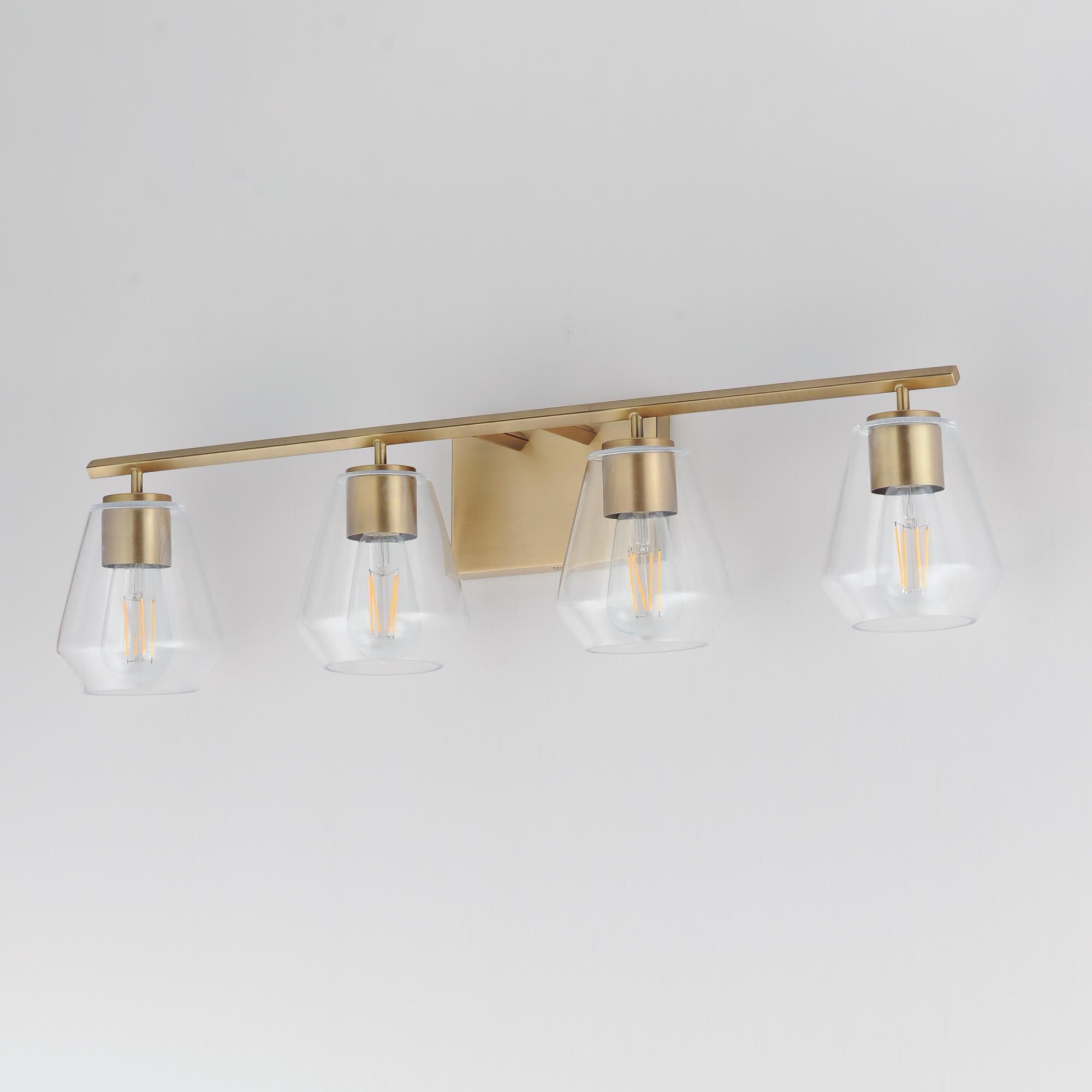 Shown in Natural Aged Brass finish and Clear glass