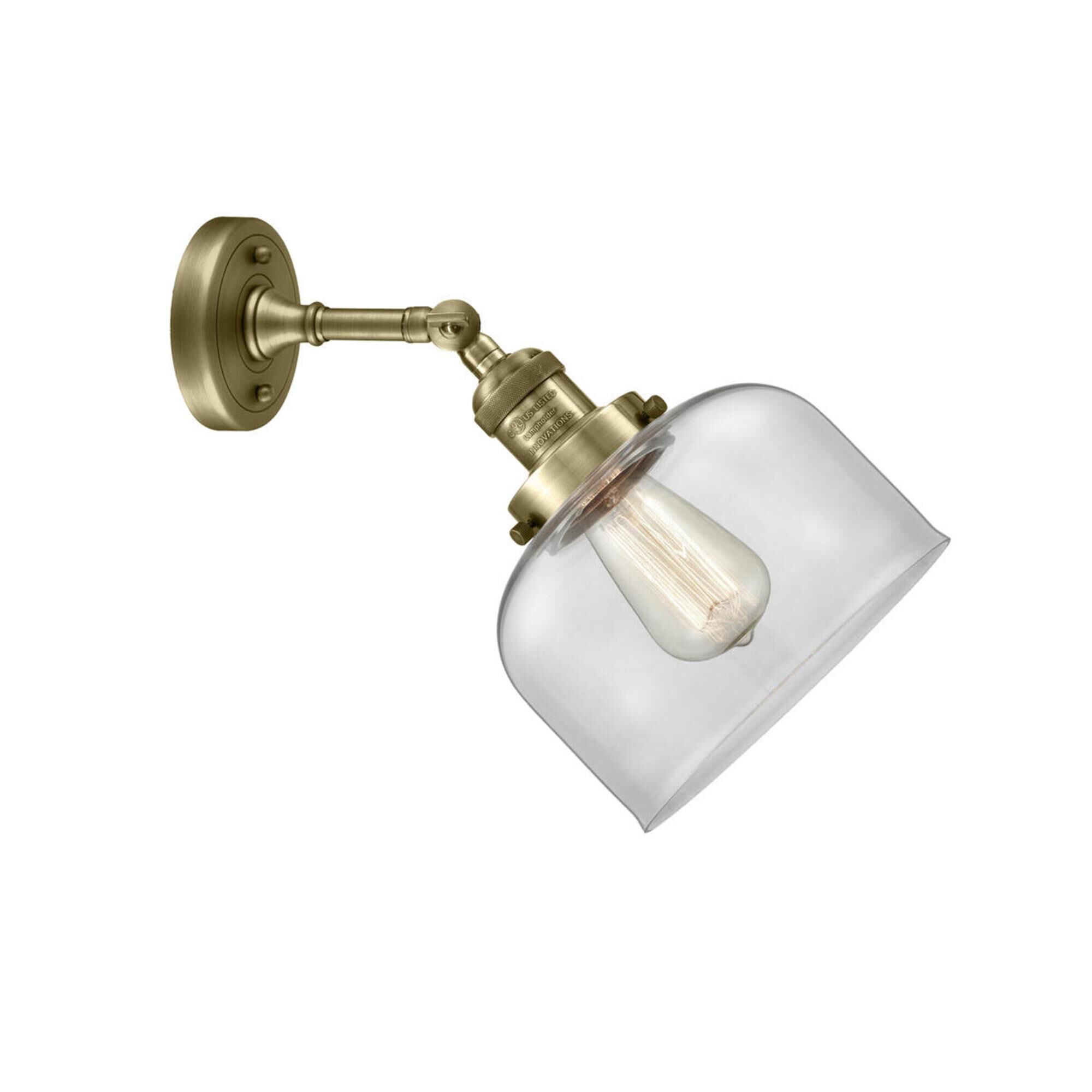 Shown in Antique Brass finish and Clear glass and None accent