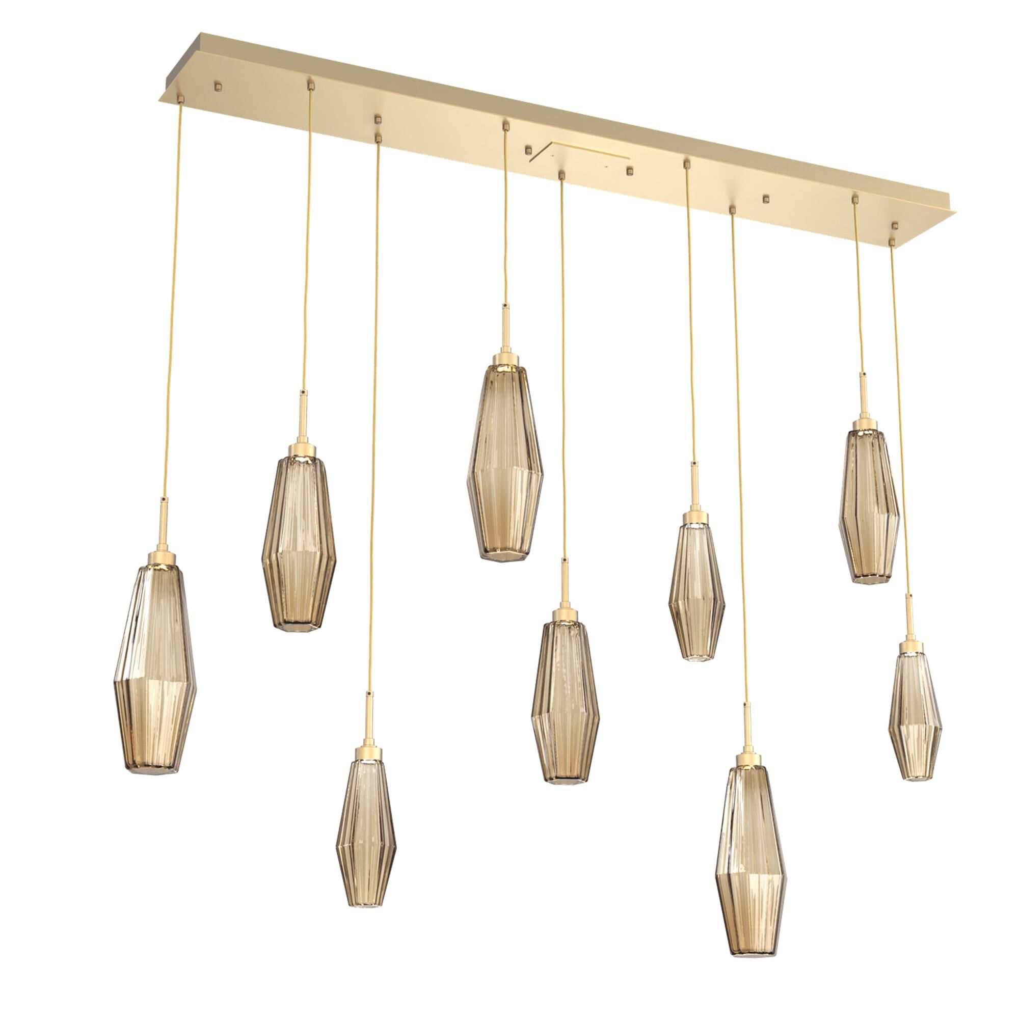 Shown in Gilded Brass finish and Optic Rib Bronze glass
