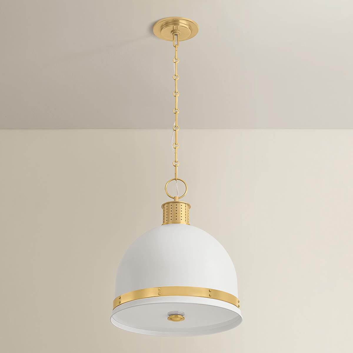Shown in Aged Brass and Soft White finish and White glass