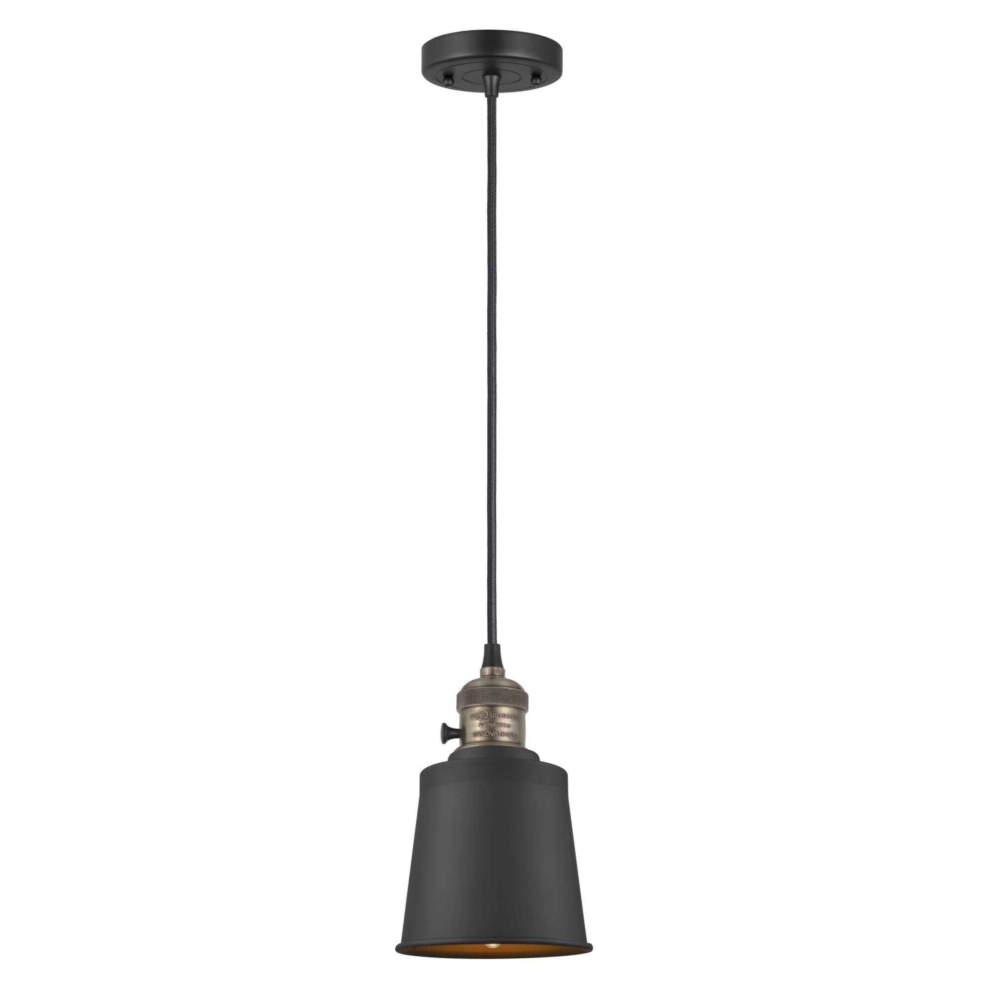 Shown in Black Antique Brass finish and Matte Black shade
