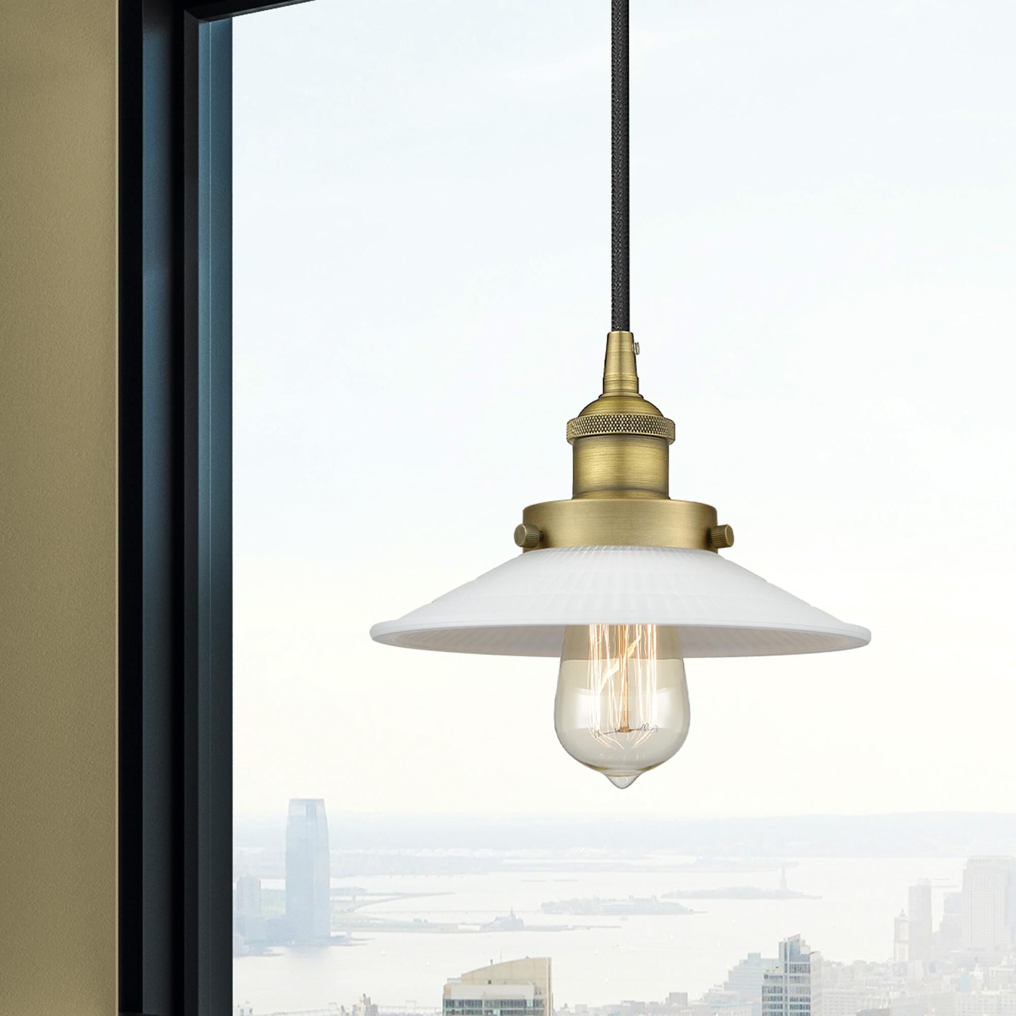 Shown in Brushed Brass finish and White glass