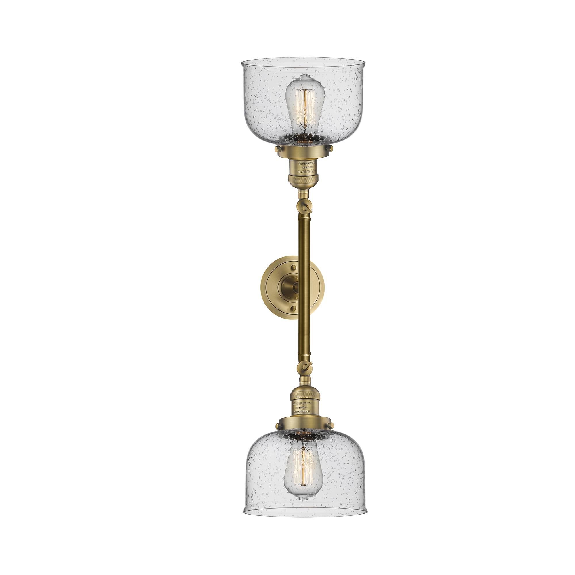 Shown in Brushed Brass finish and Seedy glass