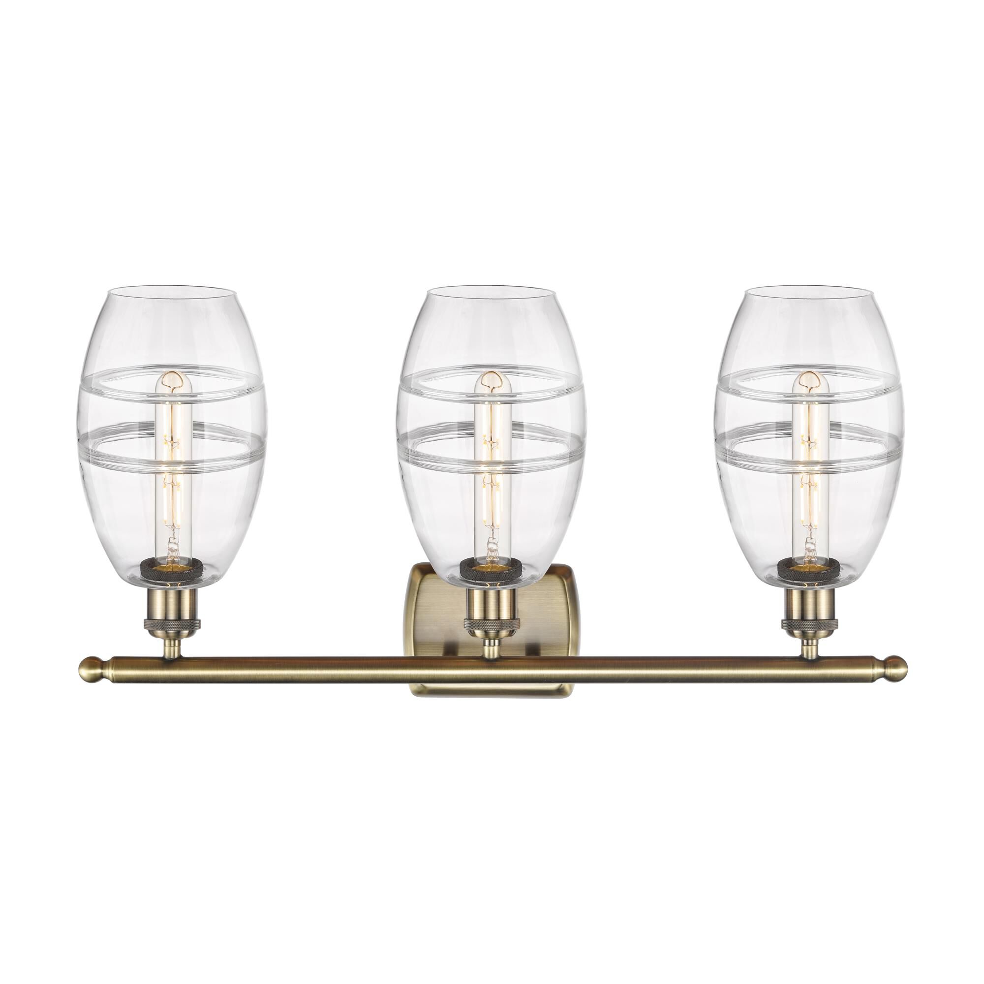 Shown in Antique Brass finish and Clear glass