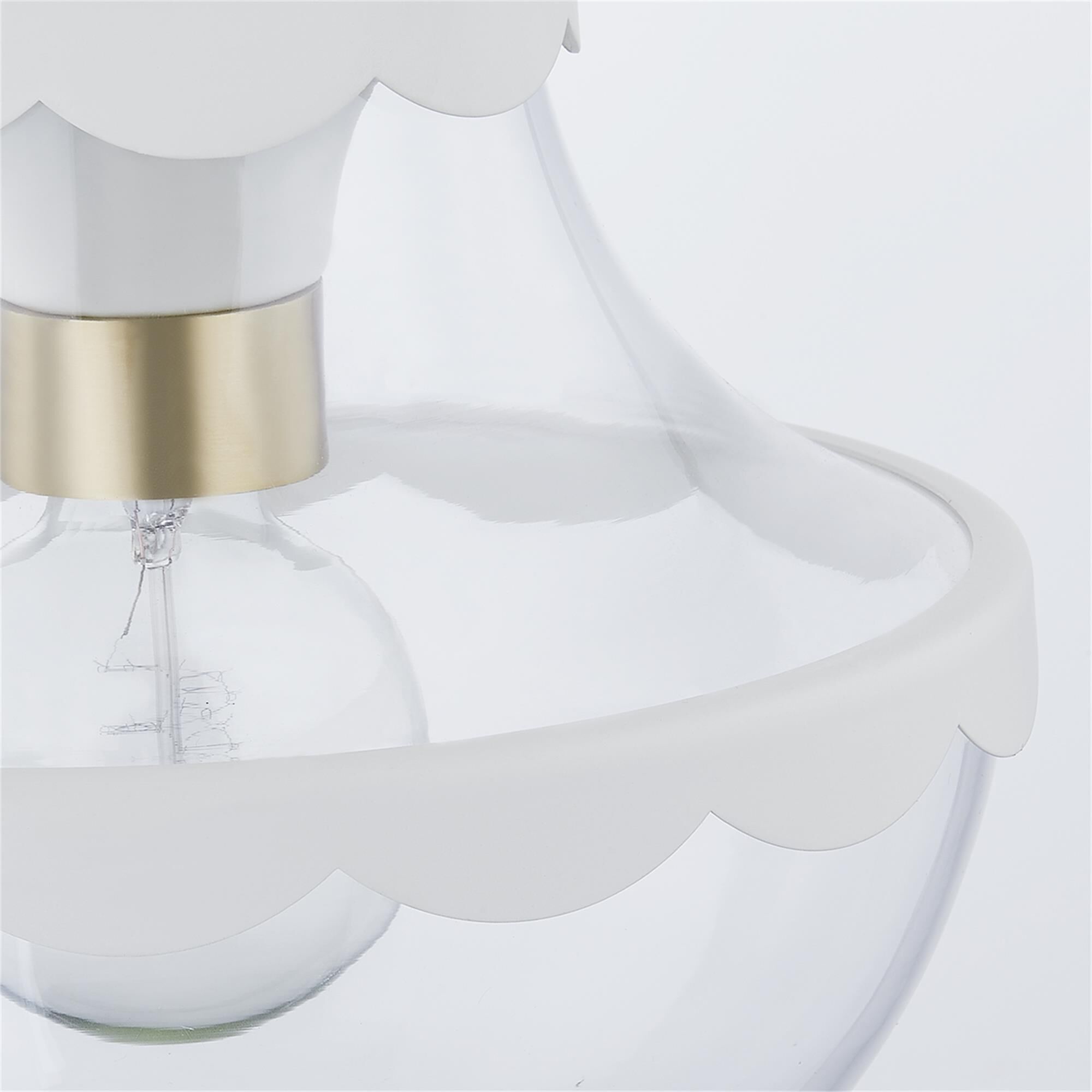 Shown in Aged Brass finish and Clear glass