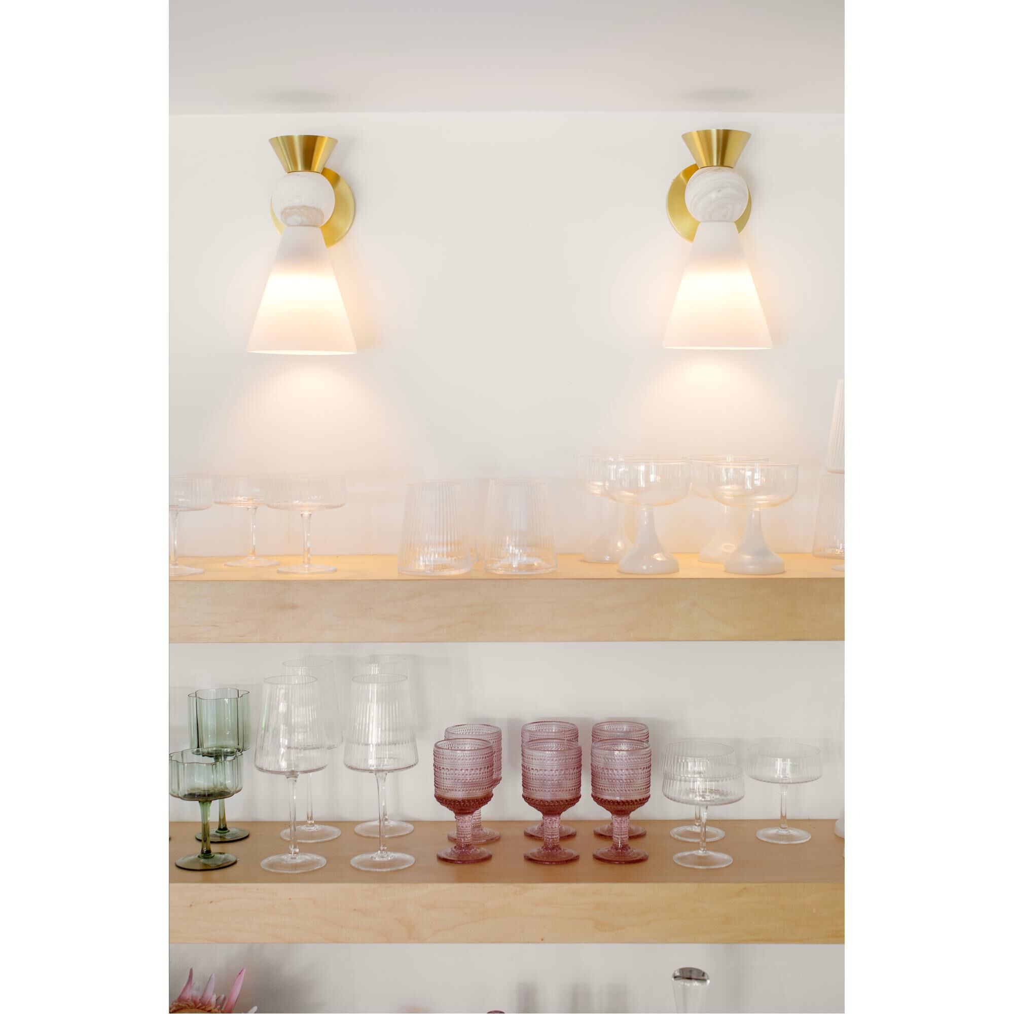 Shown in Aged Brass finish and Opal Shiny glass