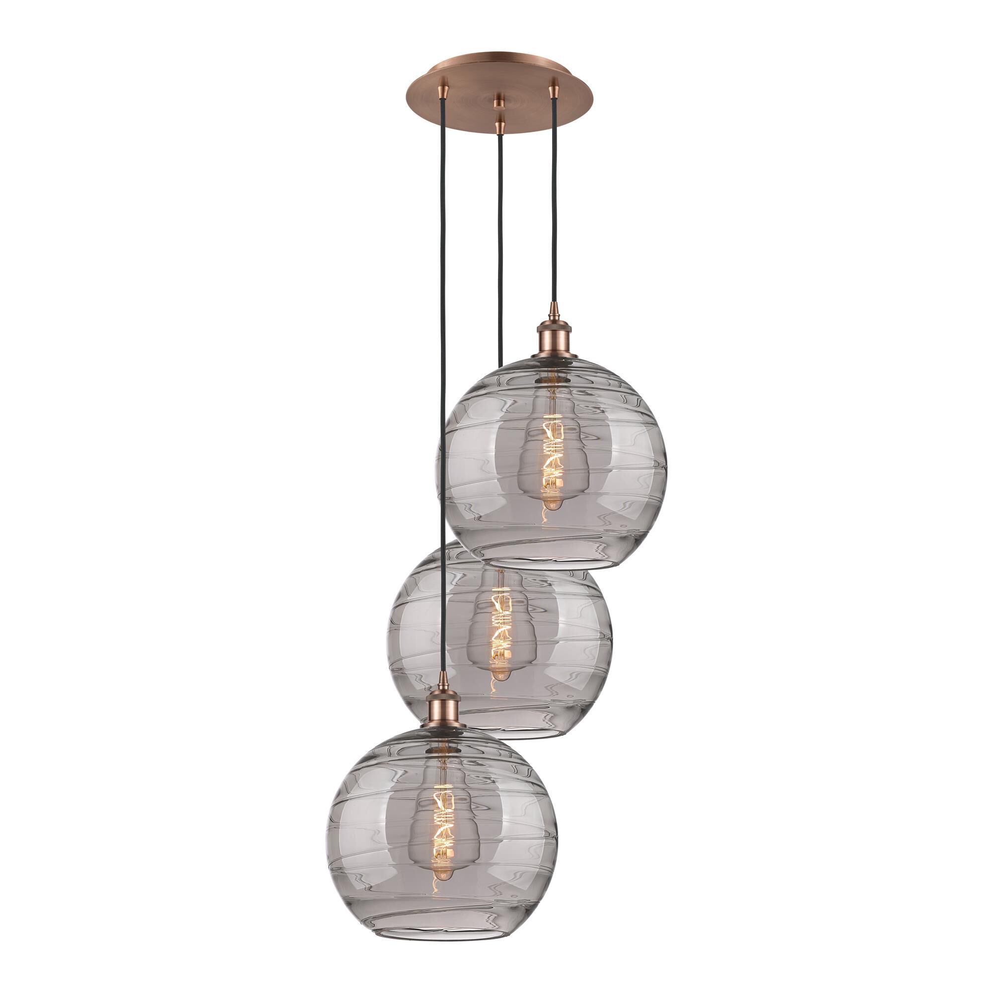 Shown in Antique Copper finish and Light Smoke Deco Swirl glass