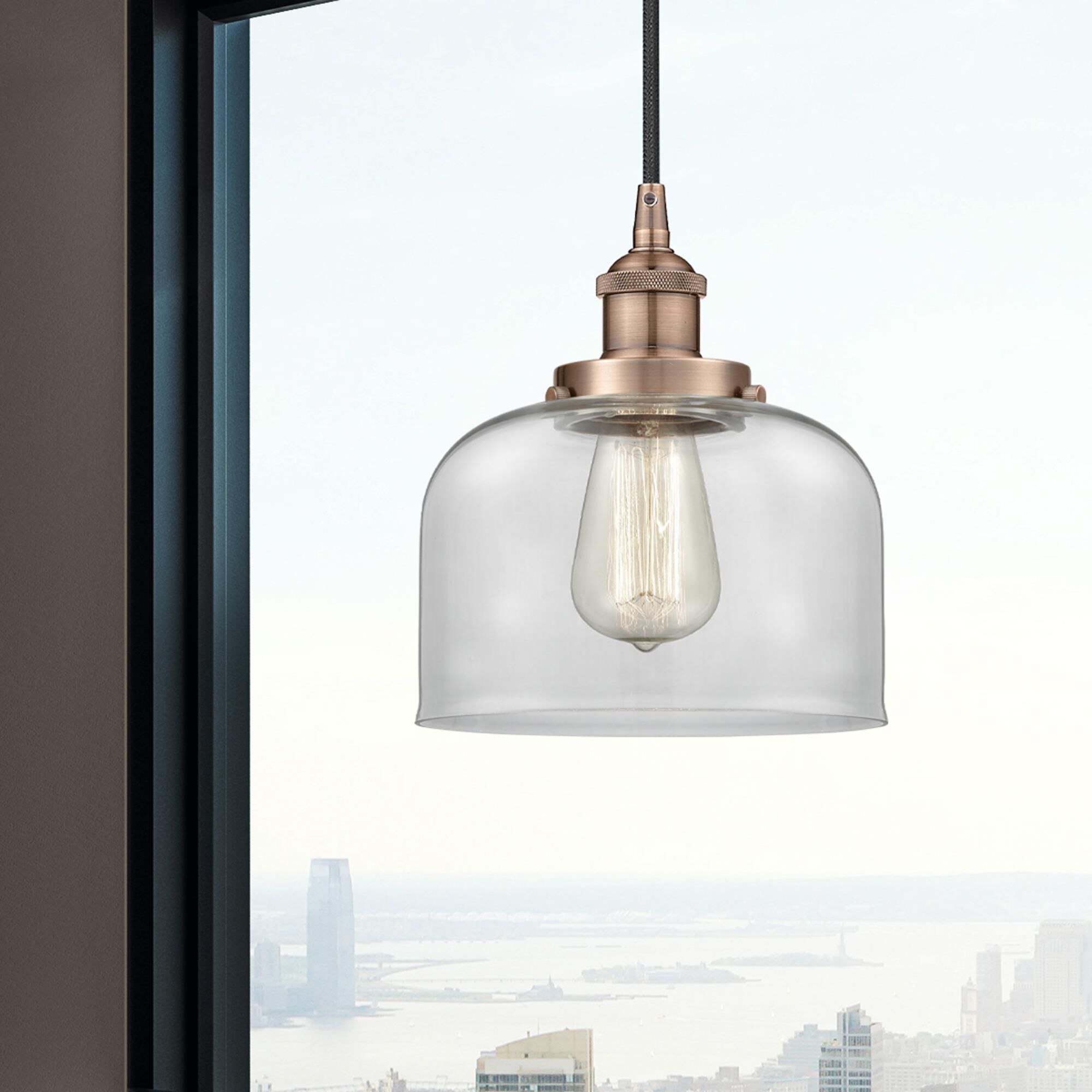 Shown in Antique Copper finish and Clear Large Bell glass