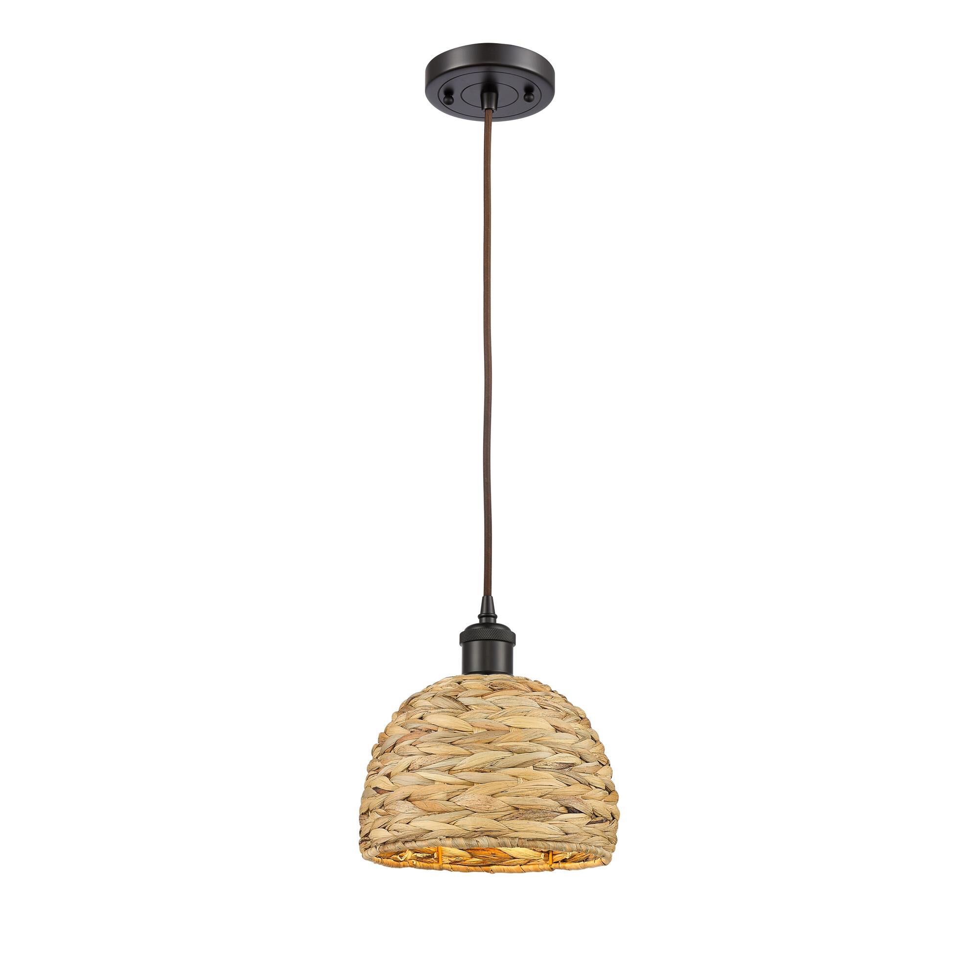 Shown in Oiled Brass finish and Natural Rattan Rattan shade