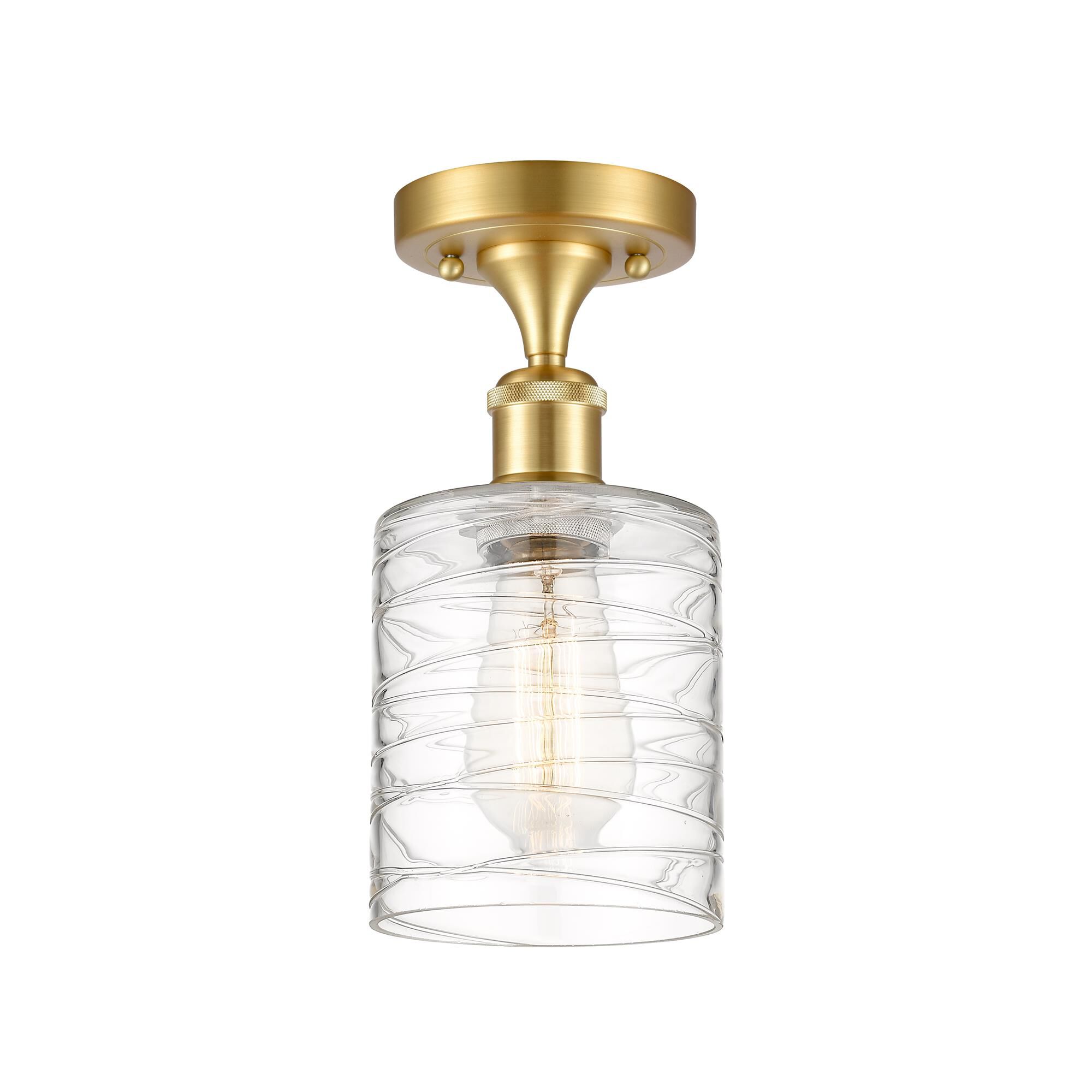 Shown in Satin Gold finish and Deco Swirl Cobbleskill glass