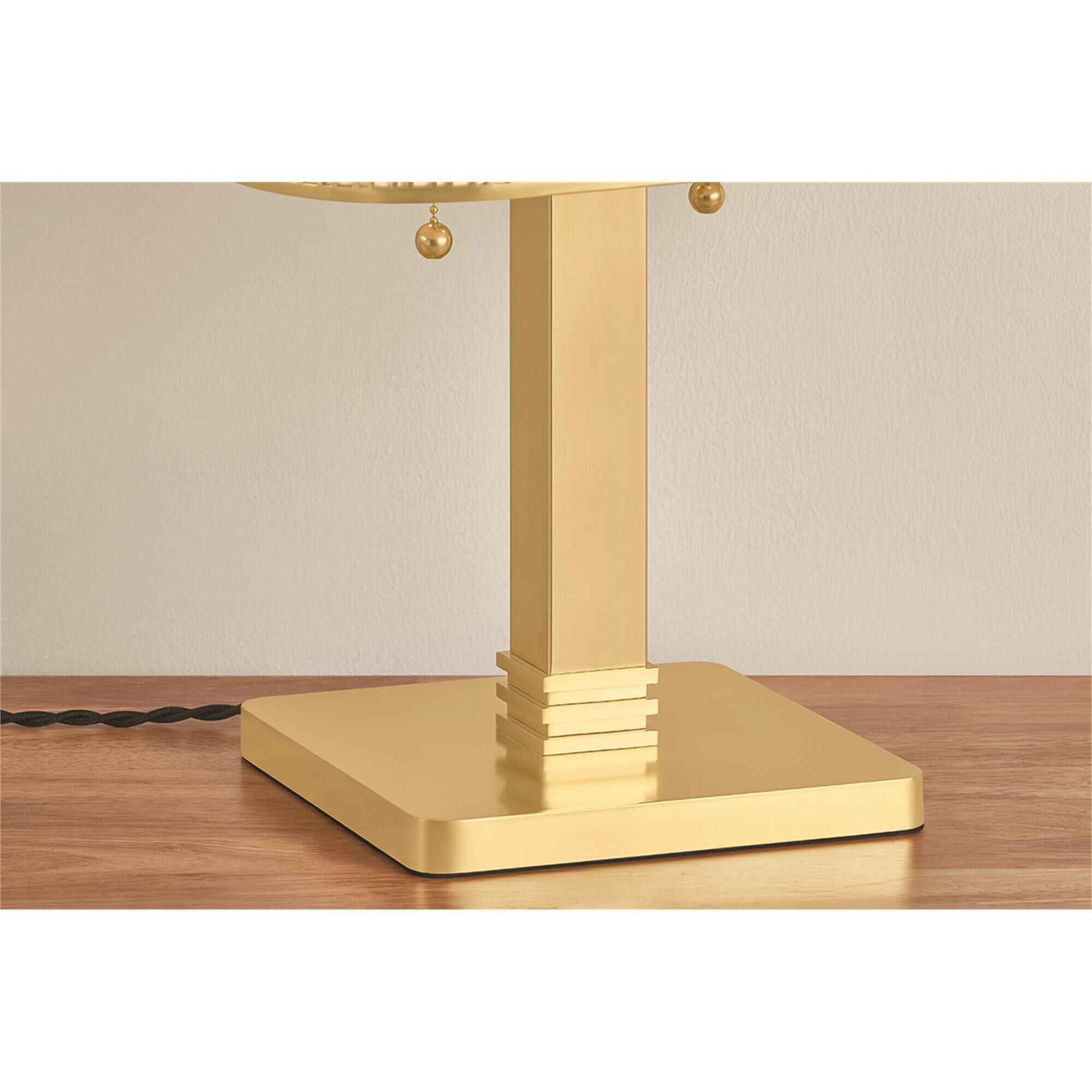 Shown in Aged Brass finish and Raw Silk shade