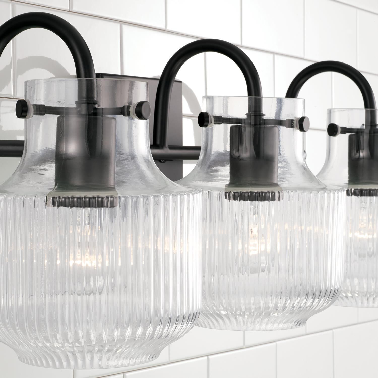 Shown in Matte Black finish and Clear Fluted glass