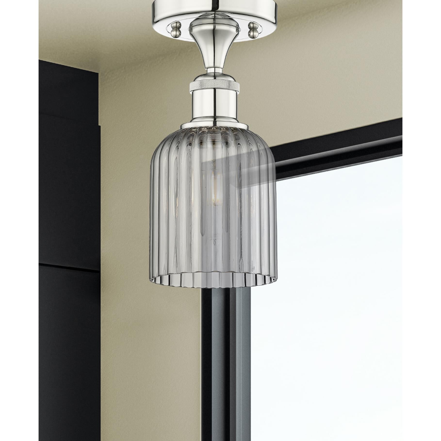 Shown in Polished Nickel finish and Light Smoke glass