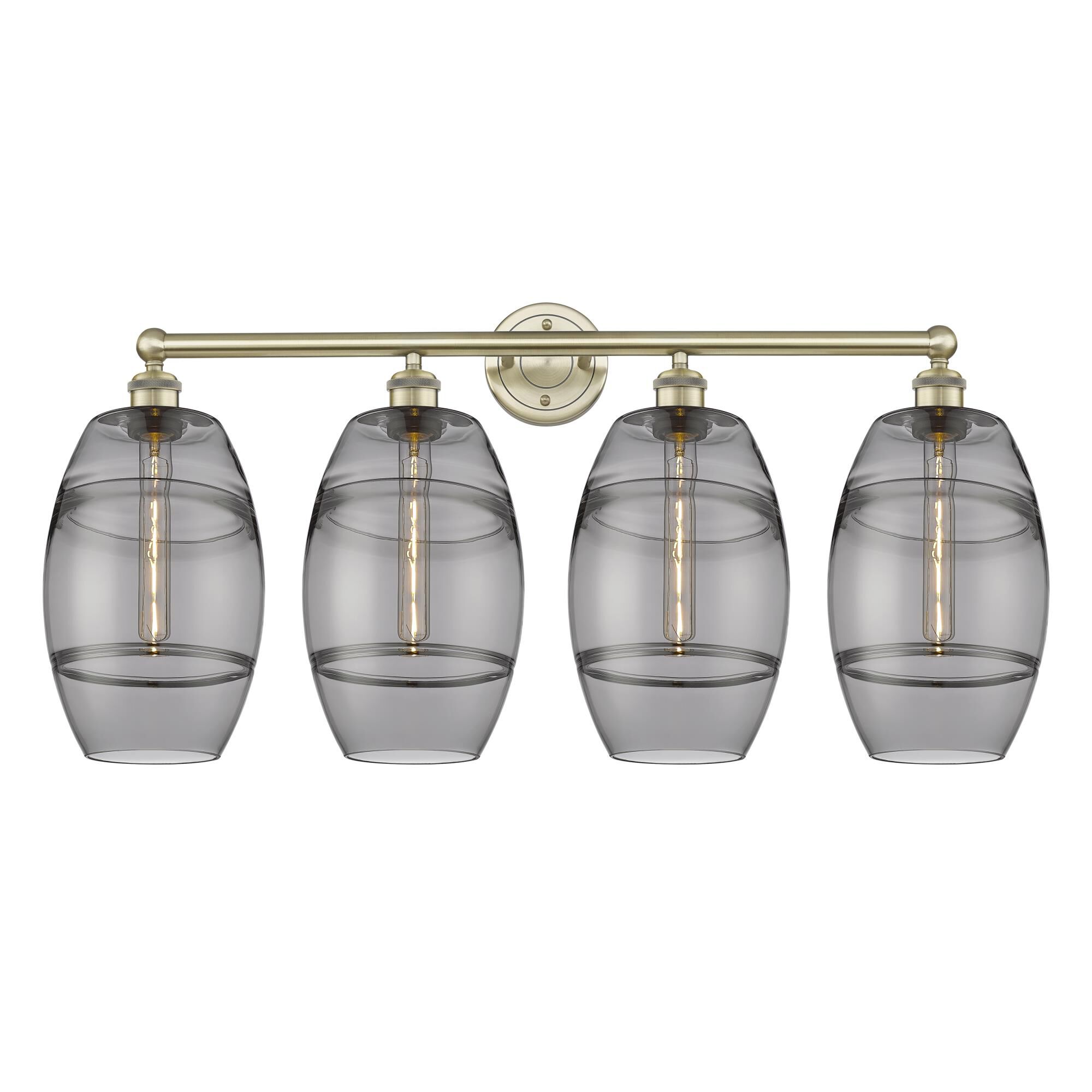 Shown in Antique Brass finish and Light Smoke glass