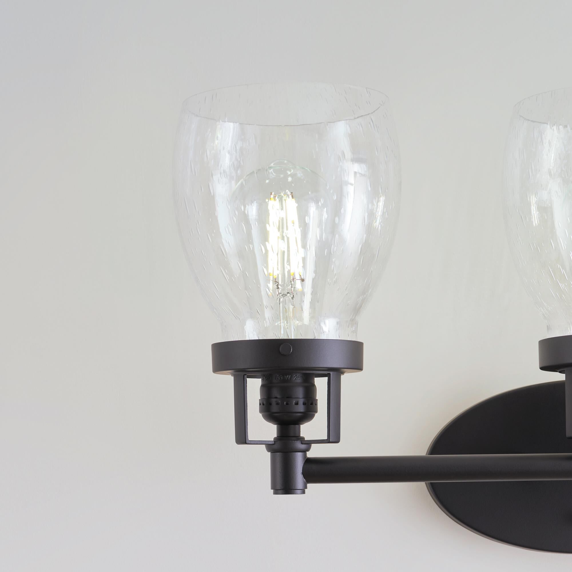 Shown in Midnight Black finish and Clear Seeded glass