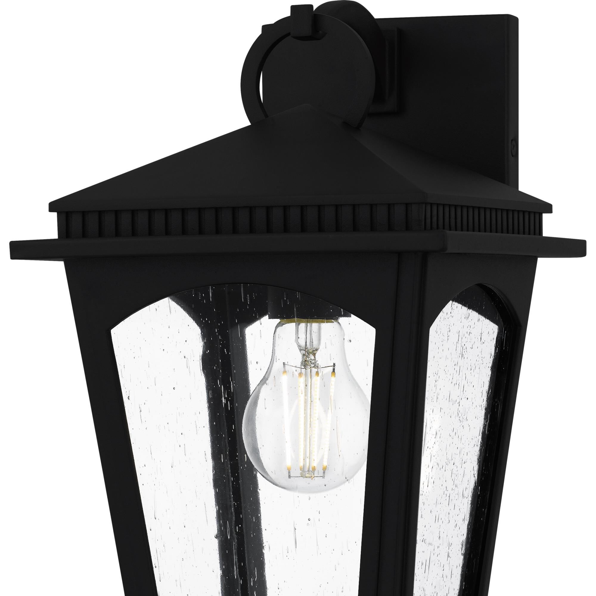 Shown in Earth Black finish and Clear Seedy Glass shade