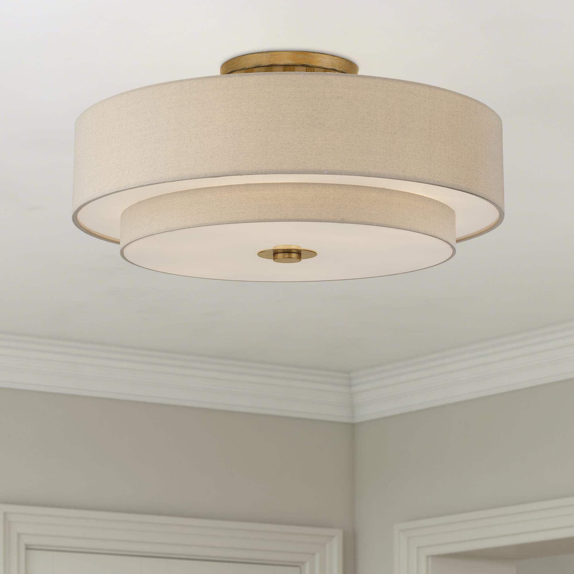 Shown in Antique Gold Leaf finish and Hand Crafted Parchment Color Hardback Fabric with White Color Inside shade