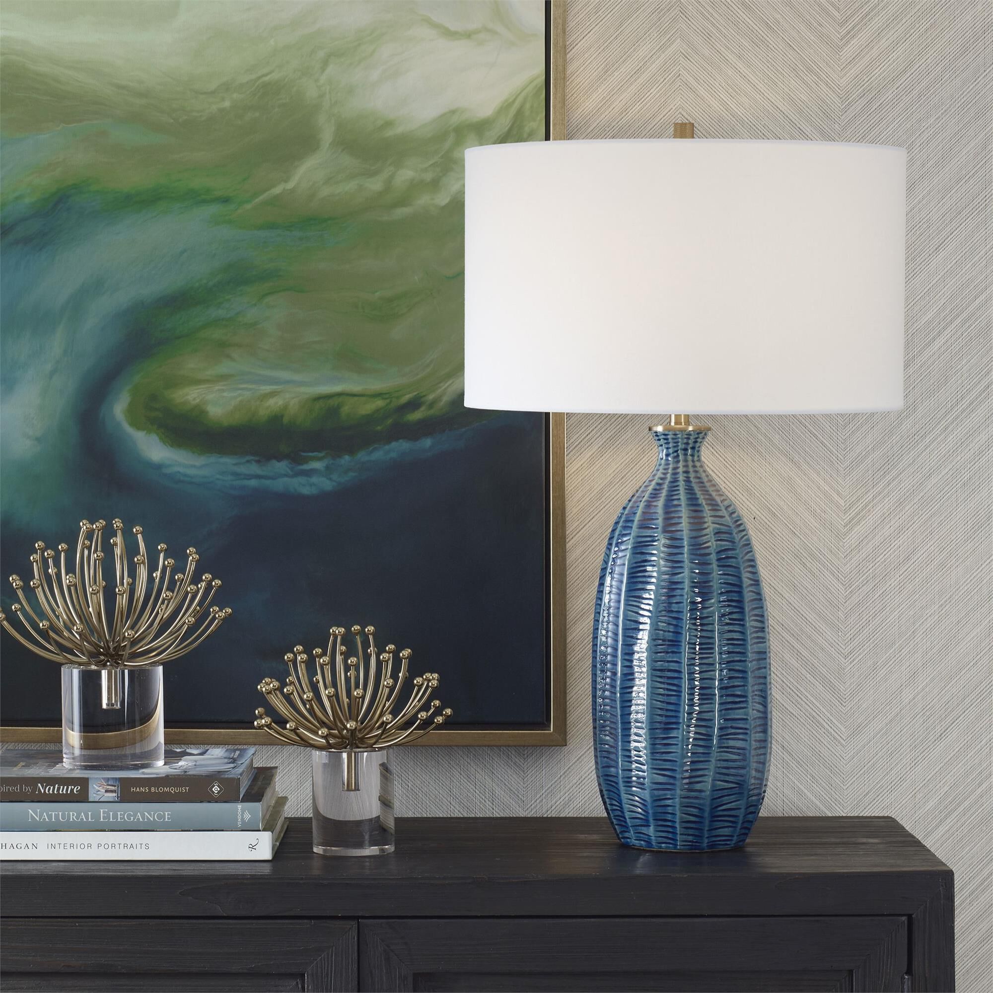 Shown in Where Coastal Charm Meets Refined Elegance, Featuring A Heavily Textured Ceramic Base In A Rich Blue finish and Drum With Liner shade