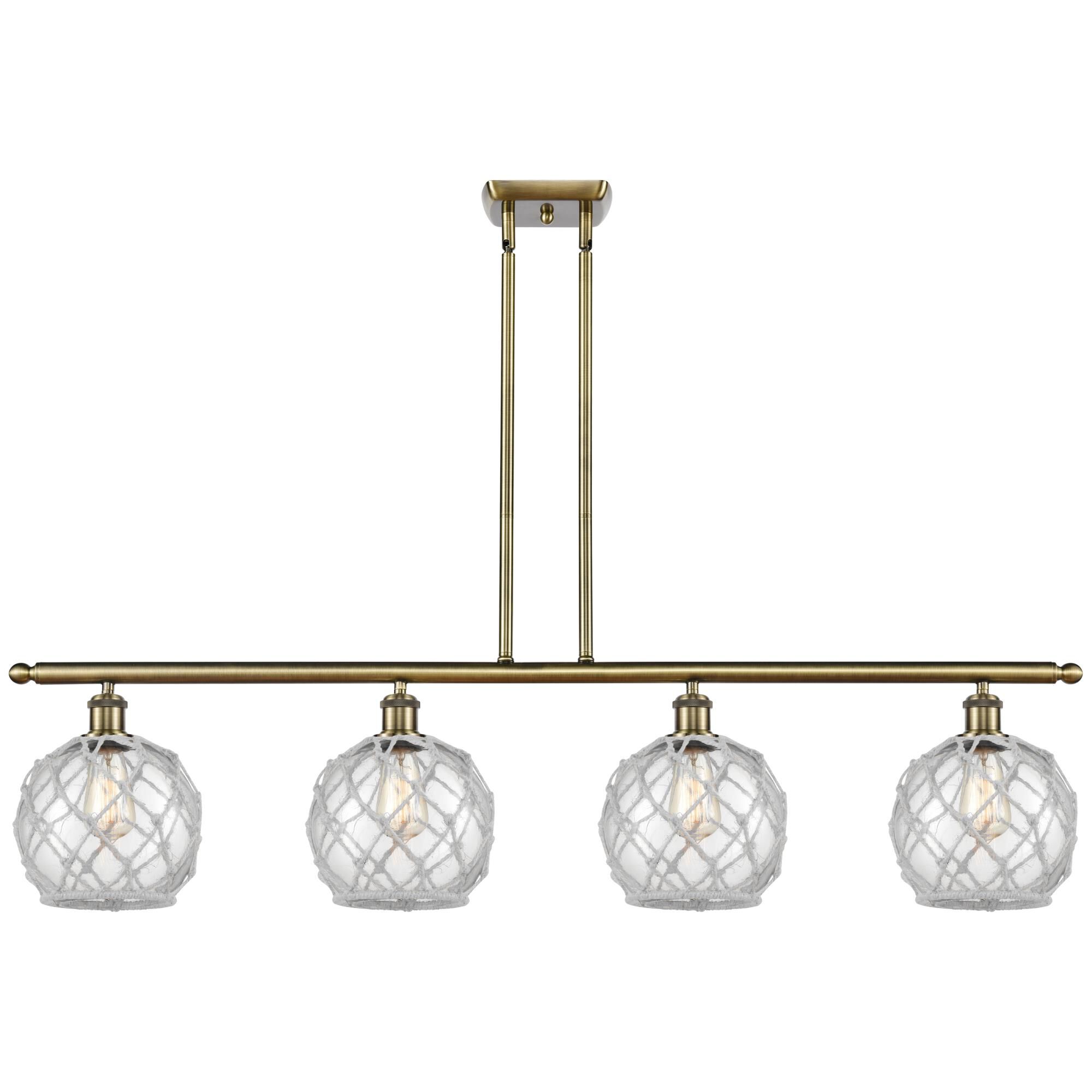 Shown in Antique Brass finish and Clear with White Rope glass