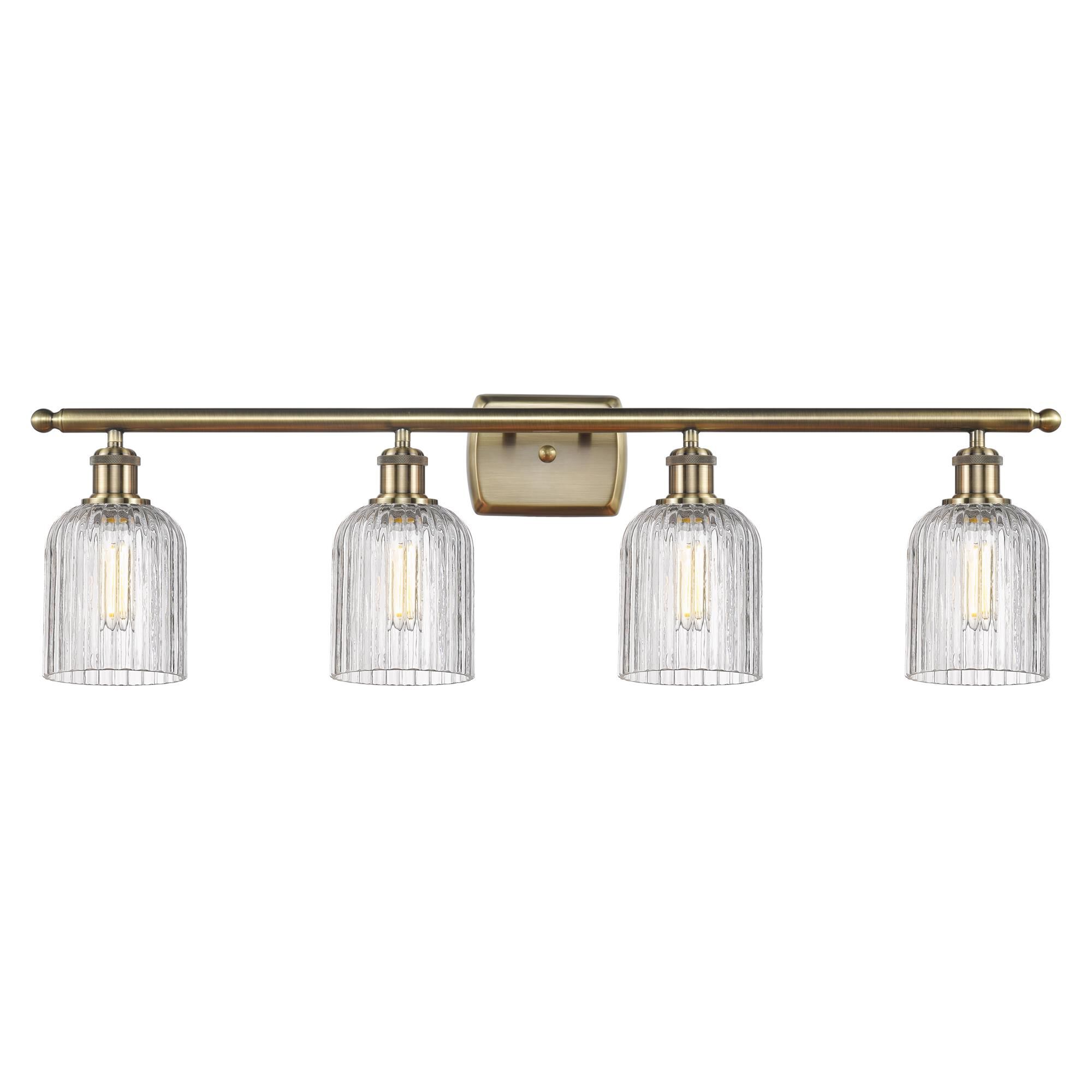 Shown in Antique Brass finish and Clear glass