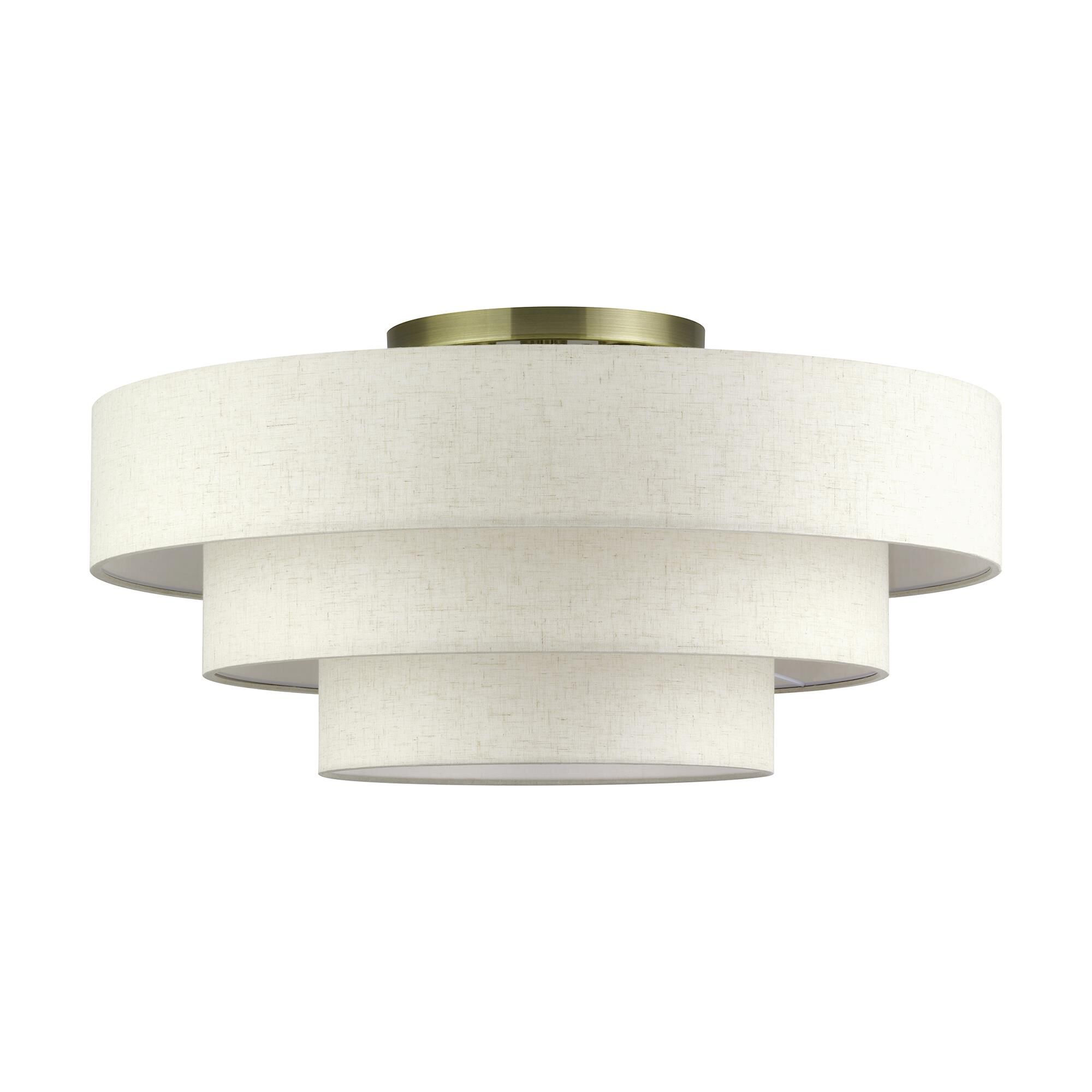 Shown in Antique Brass finish and Hand Crafted Oatmeal Color Fabric with White Color Inside shade