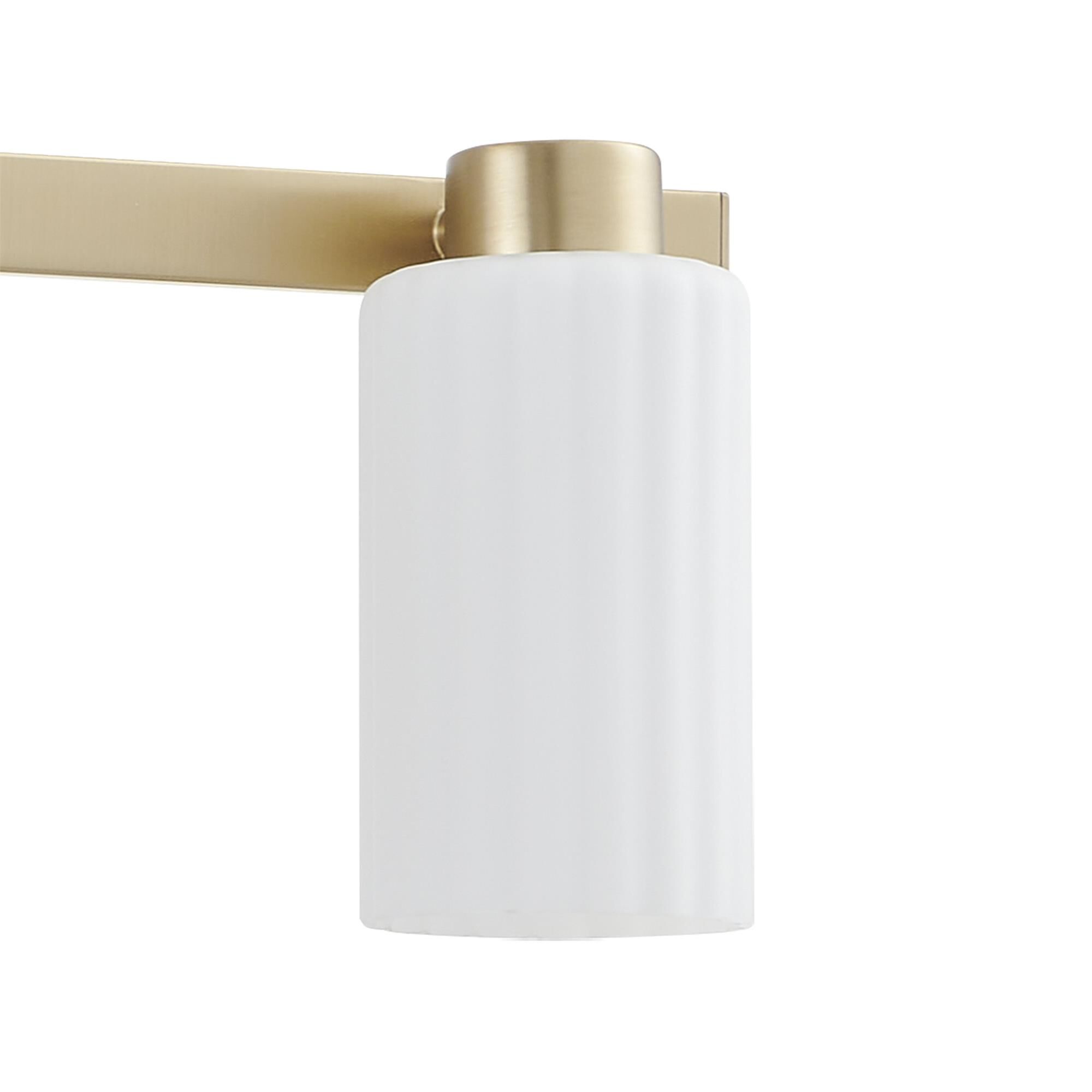 Shown in Champagne Gold finish and Etched Opal Ribbed glass